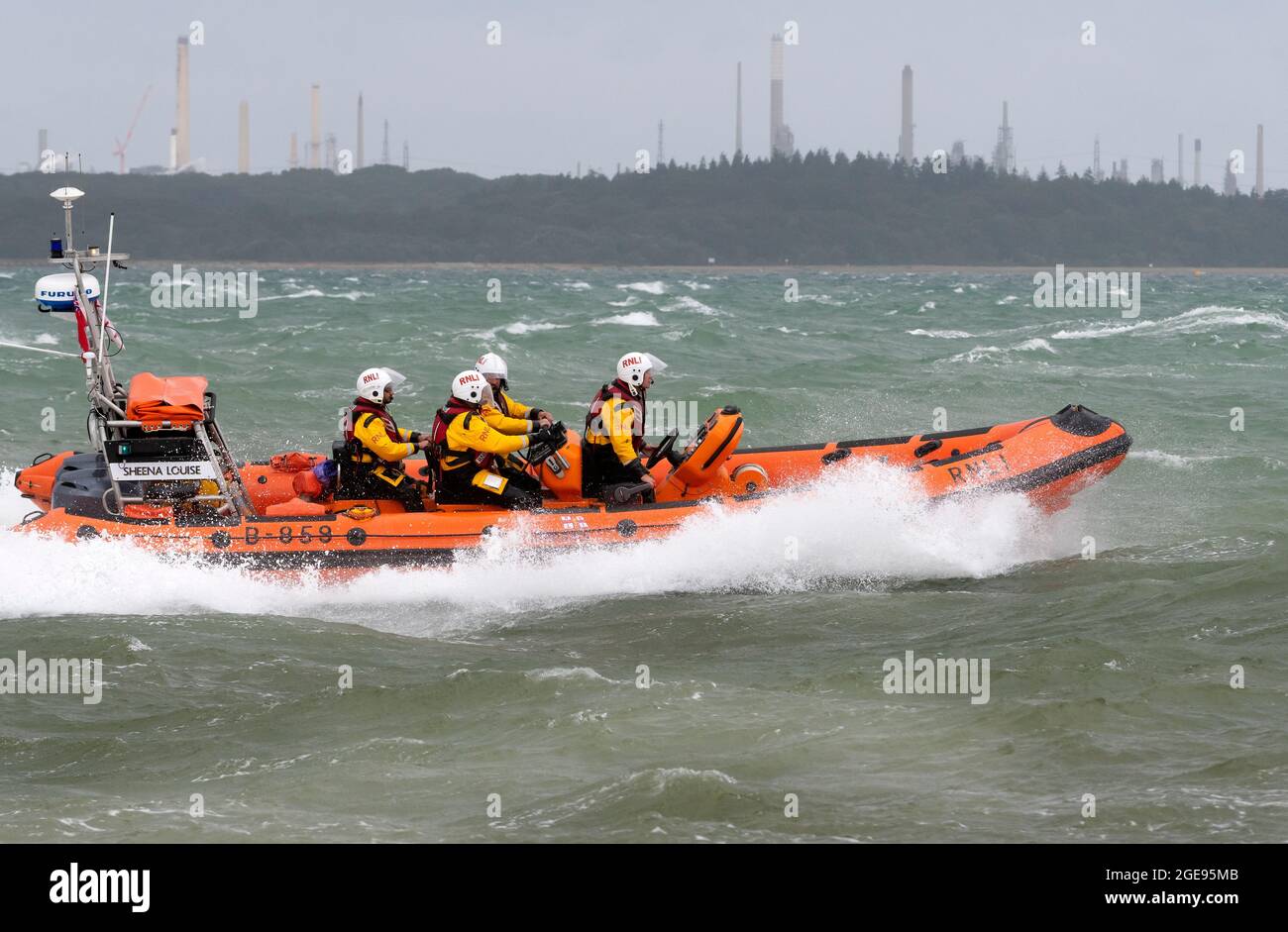 RNLI lifeboat at start of Rolex Fastnet Race on 8 August 2021.The competitors faced gruelling conditions with high winds.Cowes,Isle of Wight,England, Stock Photo