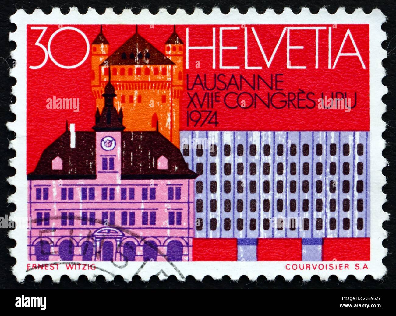 SWITZERLAND - CIRCA 1974: a stamp printed in the Switzerland shows Old Houses, Parliament and RR Station, Bern, Centenary of the UPU, circa 1974 Stock Photo