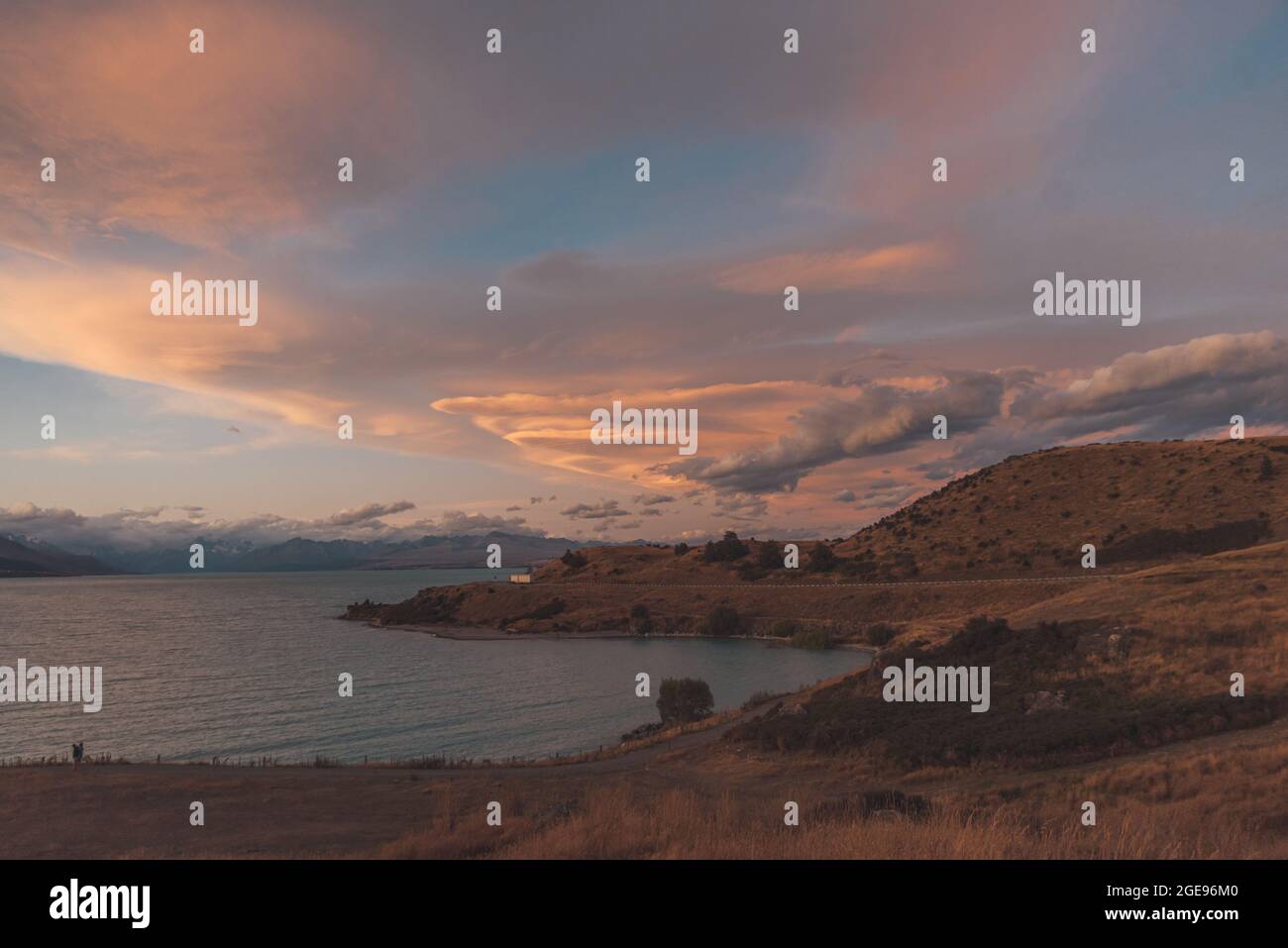 Amazing sunset at Pukaki lake in New Zealand south island Stock Photo ...