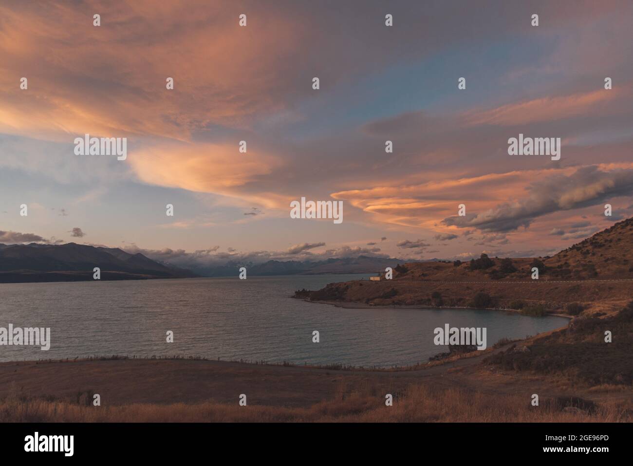 Amazing sunset at Pukaki lake in New Zealand south island Stock Photo ...