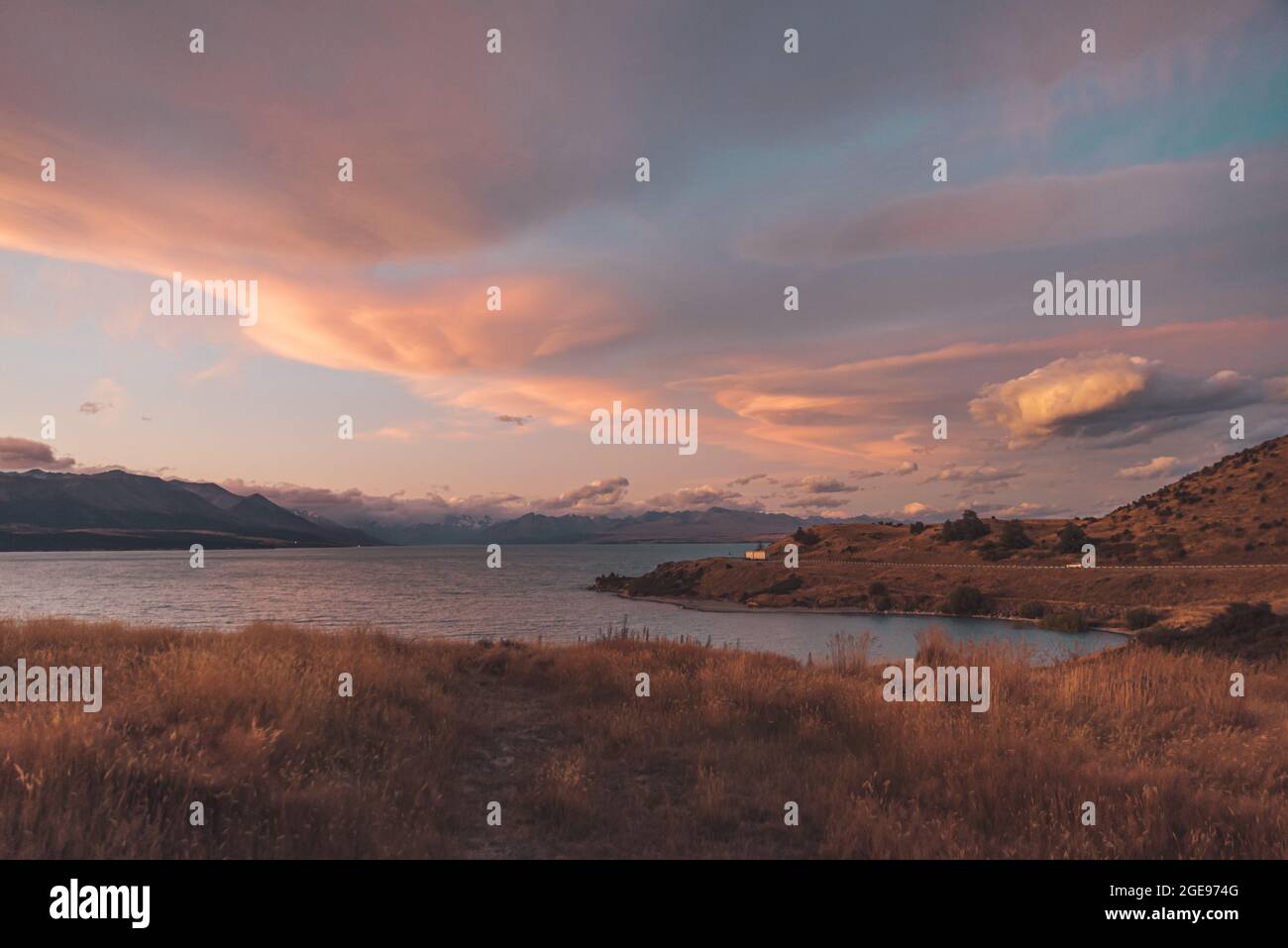 Amazing sunset at Pukaki lake in New Zealand south island Stock Photo ...