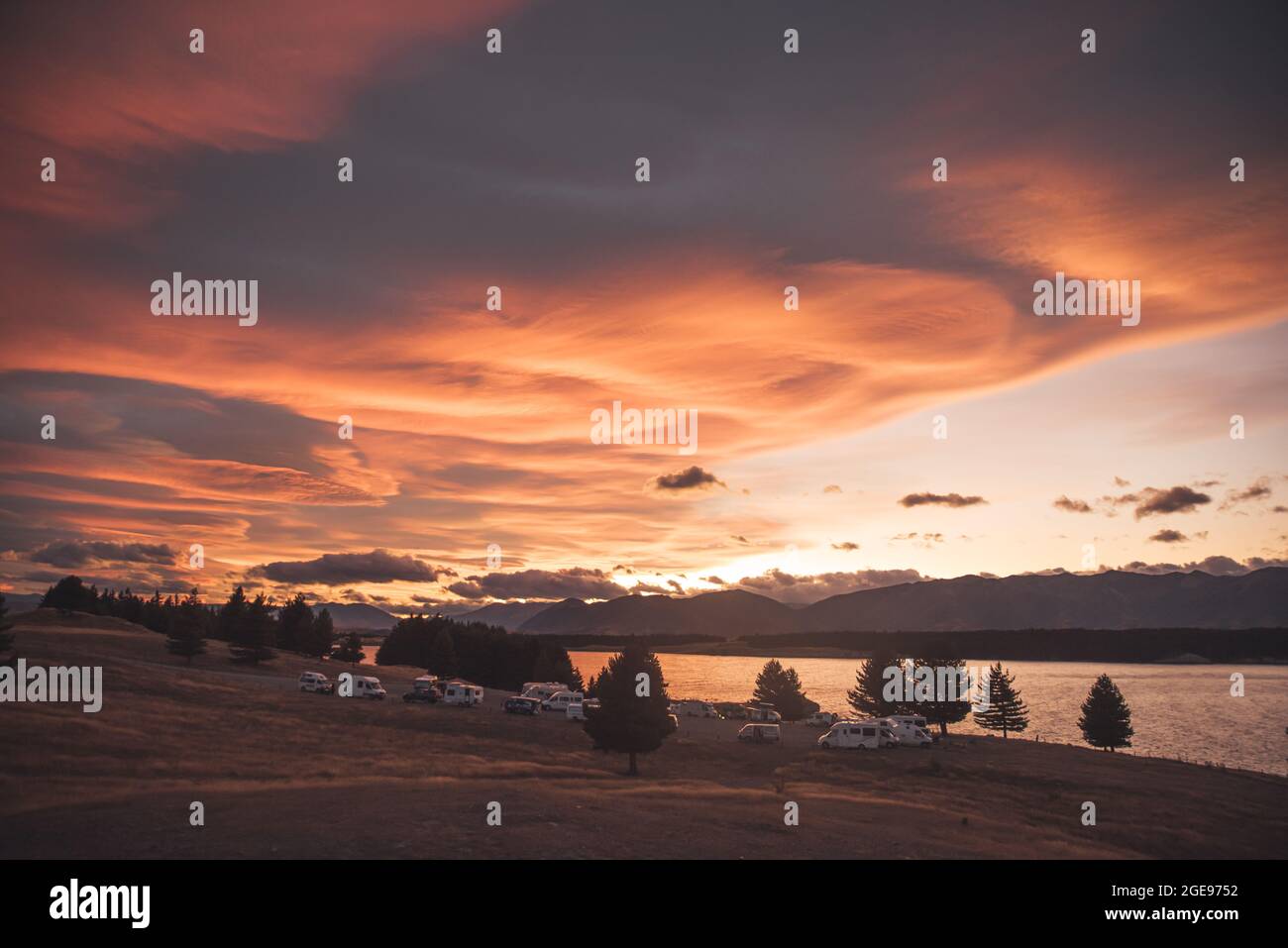Amazing sunset at Pukaki lake in New Zealand south island Stock Photo ...