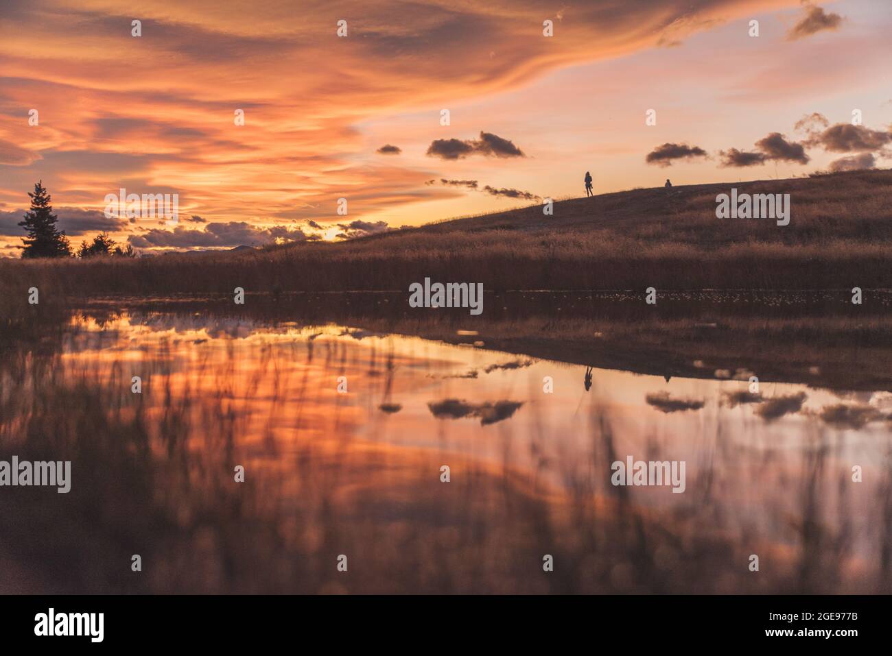 Amazing sunset at Pukaki lake in New Zealand south island Stock Photo ...