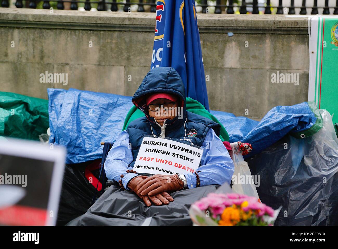 Westminster, London, UK. 18 August, 2021. 12th day of hunger strike for the Gurkhas protesting for equal pension pay outside Downing Street. Veteran Dhan Gurung. Photo Credit: Paul Lawrenson /Alamy Live News Stock Photo