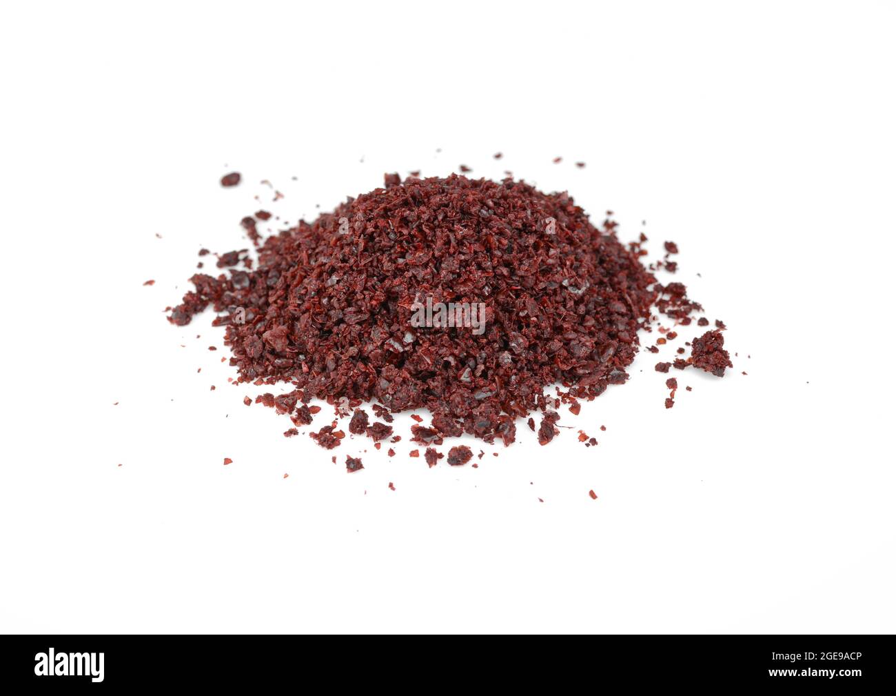 sumac spice on white. Ground Sumac Powder Spice isolated Stock Photo