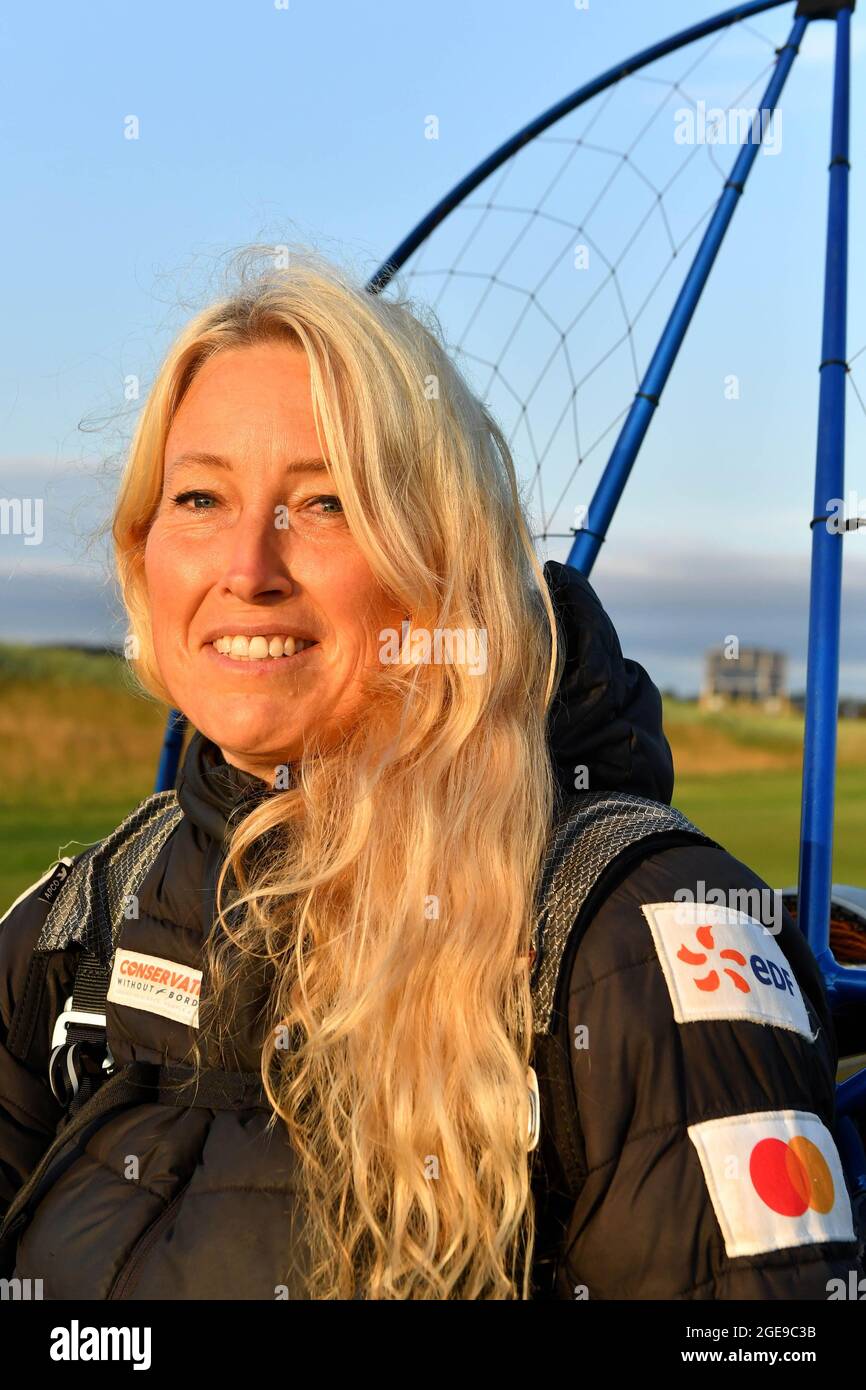 EDITORIAL USE ONLY Adventurer, Sacha Dench (also known as The Human Swan) visits The Women's Open as part of her 'Round Britain Climate Challenge', world record attempt, sponsored by Mastercard at Carnoustie in Scotland. Picture date: Wednesday August 18, 2021. Stock Photo