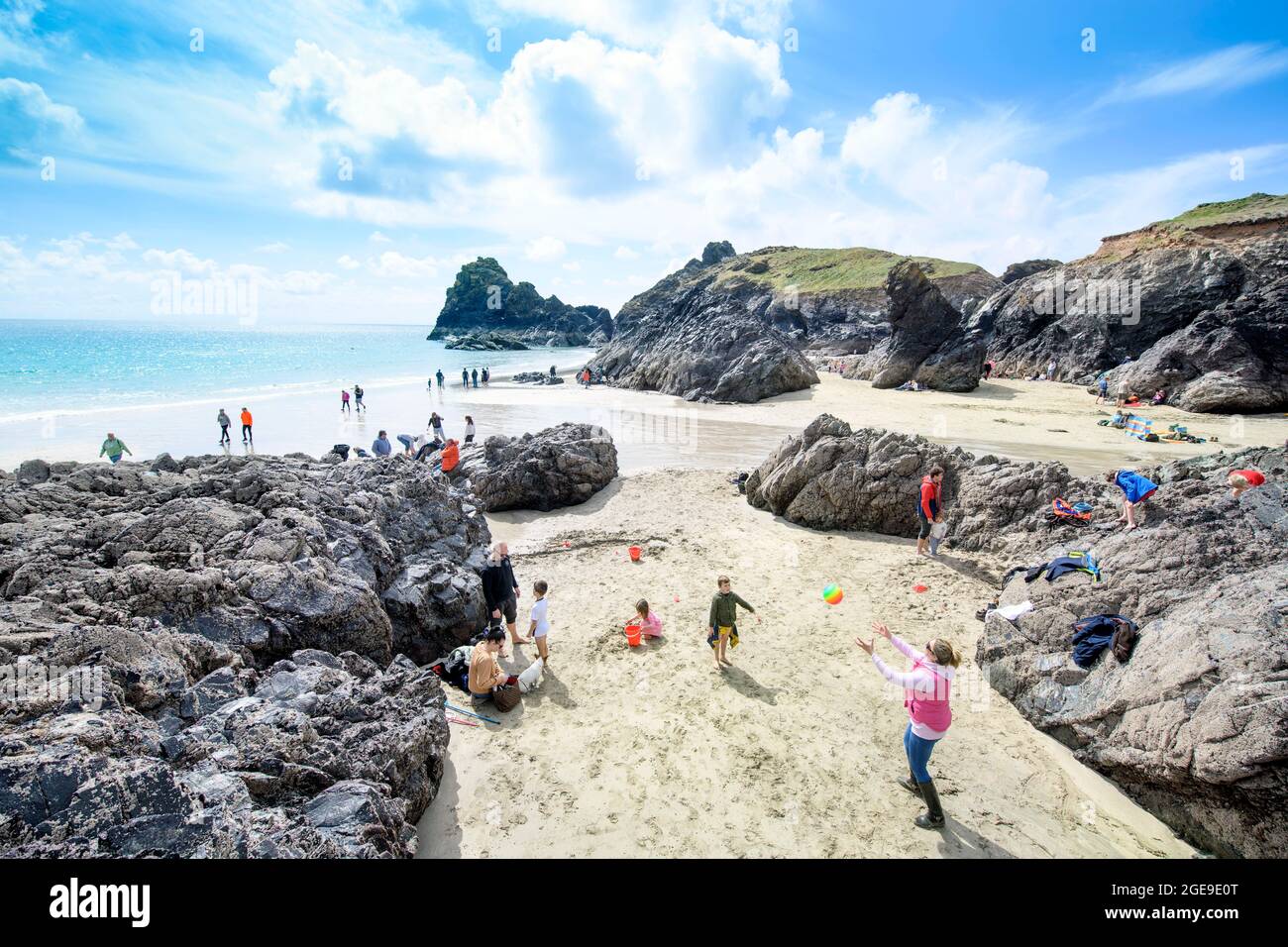 The scene at Kynance Cove on The Lizard in Cornwall as tourists begin to return to the coast after lockdown, Apr 2021 Stock Photo