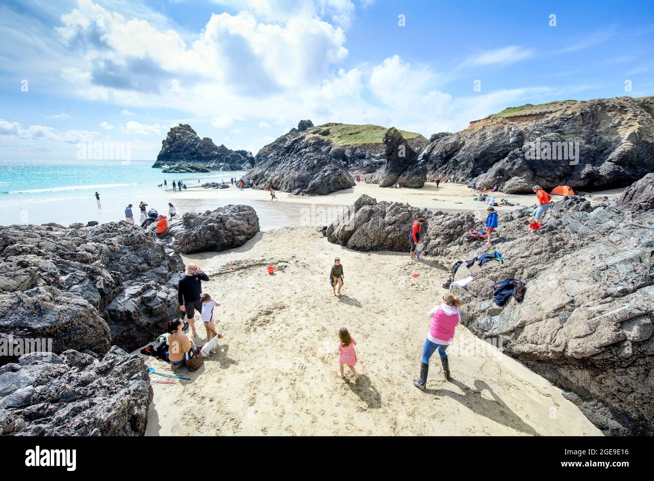 The scene at Kynance Cove on The Lizard in Cornwall as tourists begin to return to the coast after lockdown, Apr 2021 Stock Photo