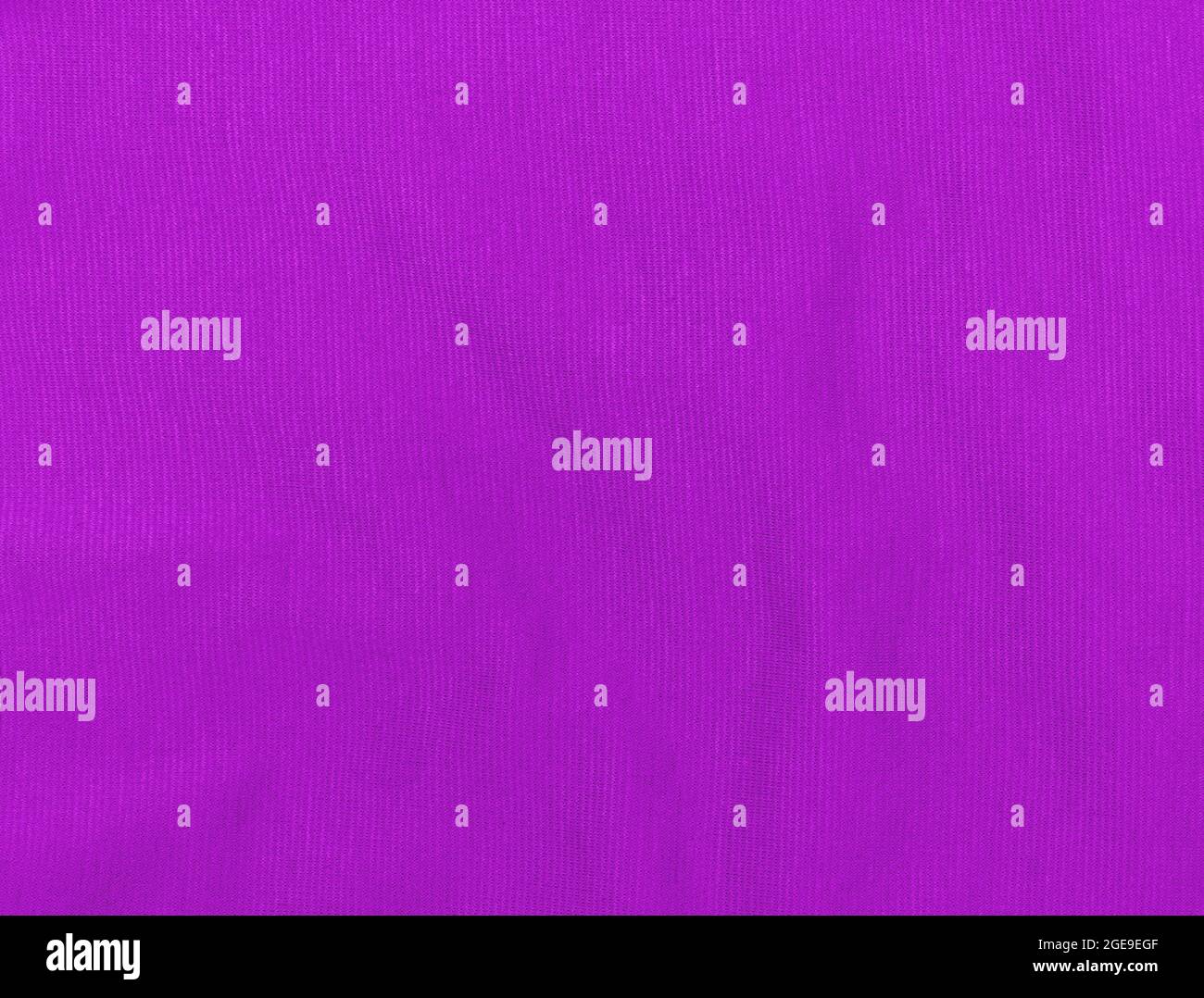 Purple jersey fabric matte texture top view. Violet knitwear satin 