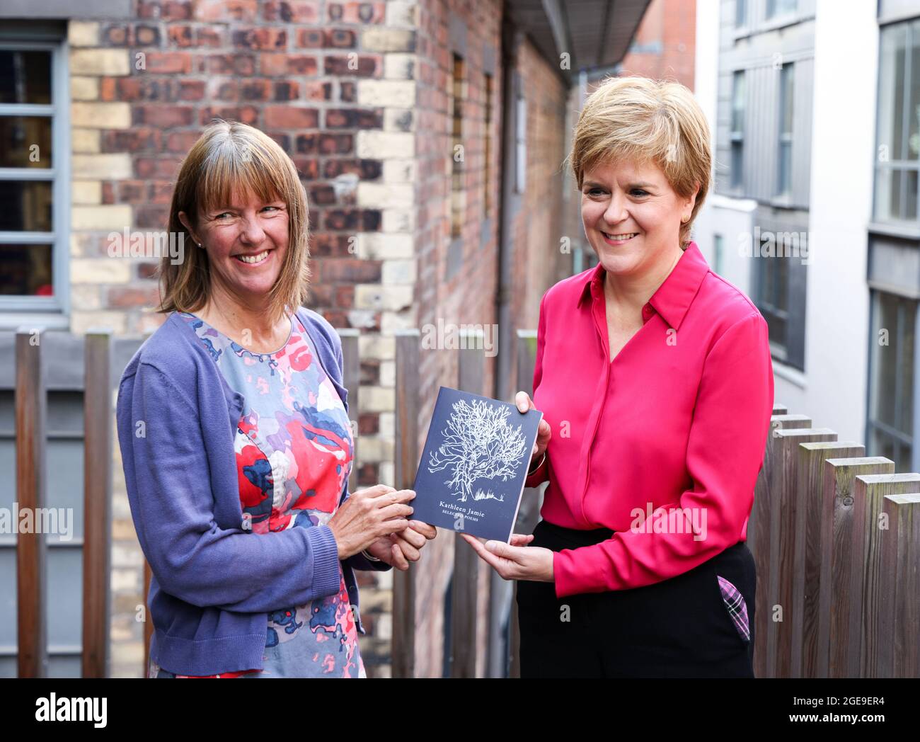 First Minister Nicola Sturgeon with Kathleen Jamie after she was announced the new Makar (National Poet for Scotland) at the Scottish Poetry Library in Edinburgh. Picture date: Wednesday August 18, 2021. Stock Photo
