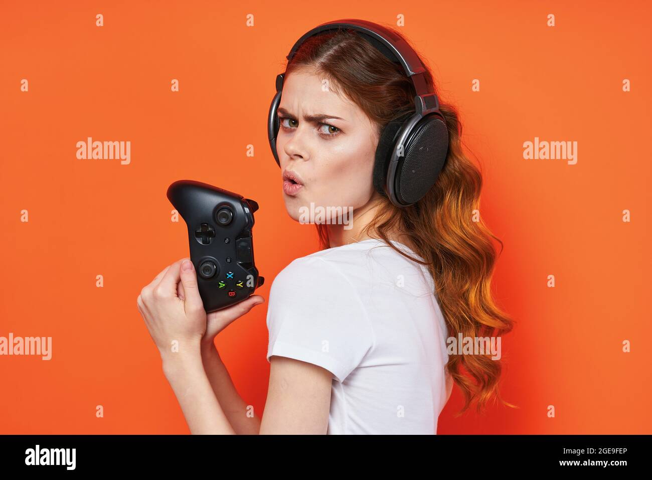 woman tshirts joysticks games entertainment technology Stock Photo Alamy