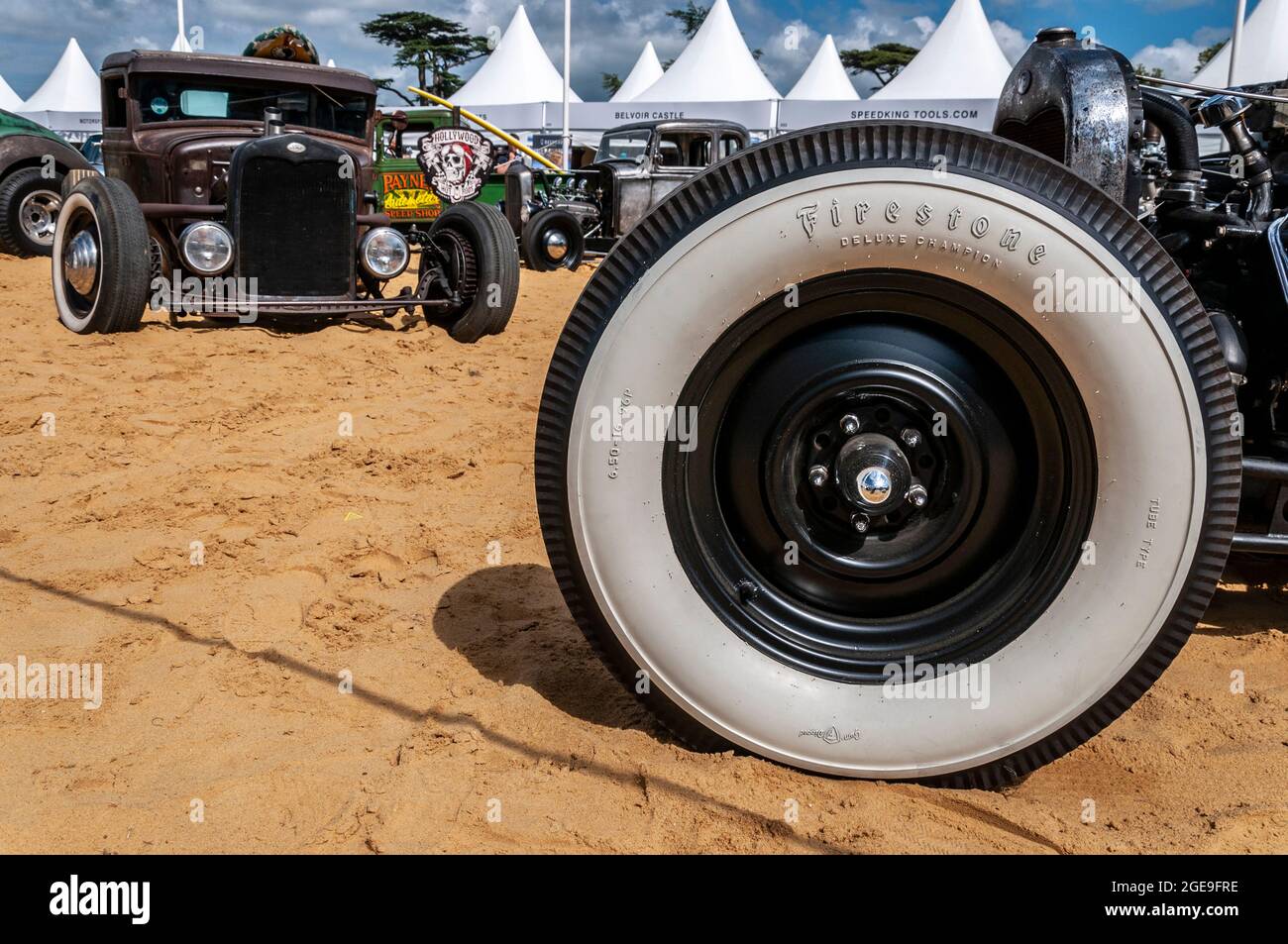 Custom drag racing cars on a beach scenario at the Goodwood Festival of Speed motor racing event 2014. Whitewall Firestone tire, tyre Stock Photo