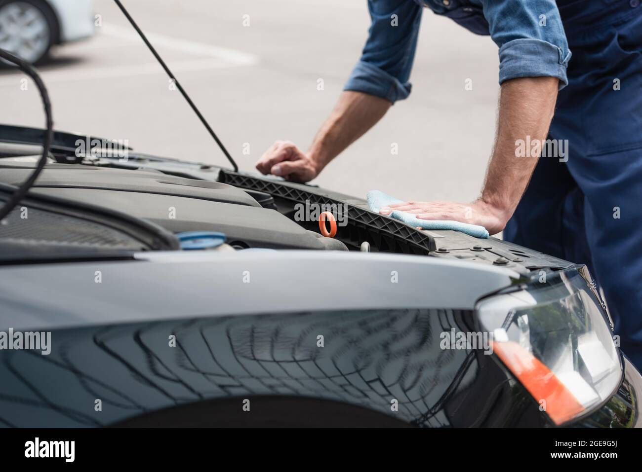 Cropped view mechanic cleaning hi-res stock photography and images - Alamy