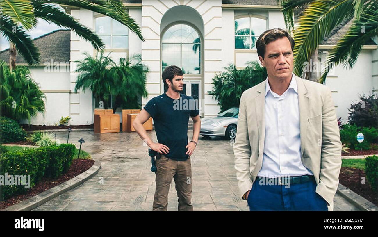 99 HOMES 2014 Broad Green Pictures film with Michael Shannon at right and Andrew Garfield Stock Photo
