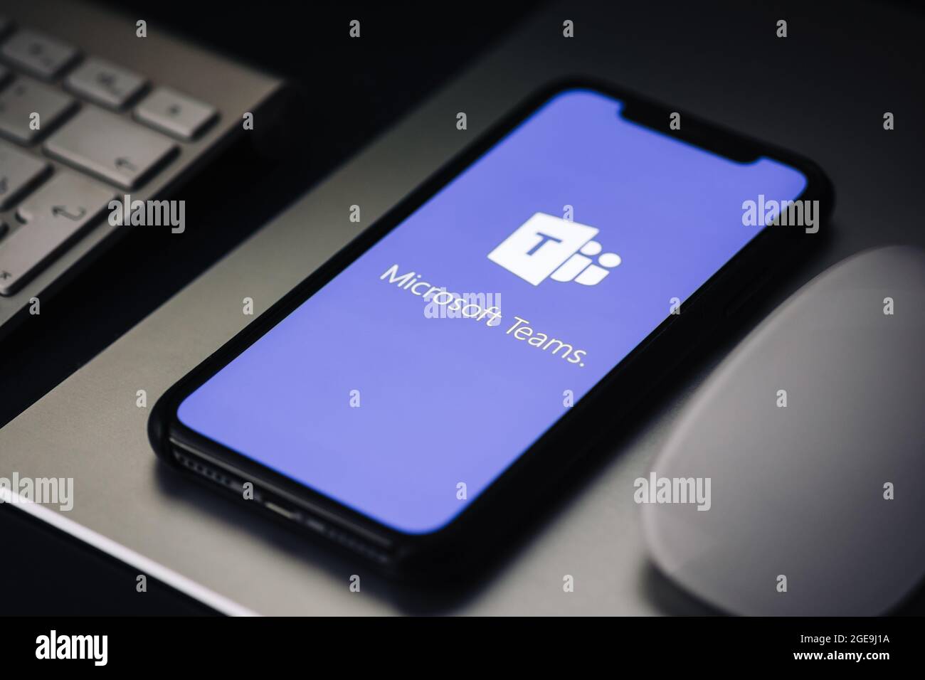 iPhone with Microsoft Teams video call app logo on the screen Stock