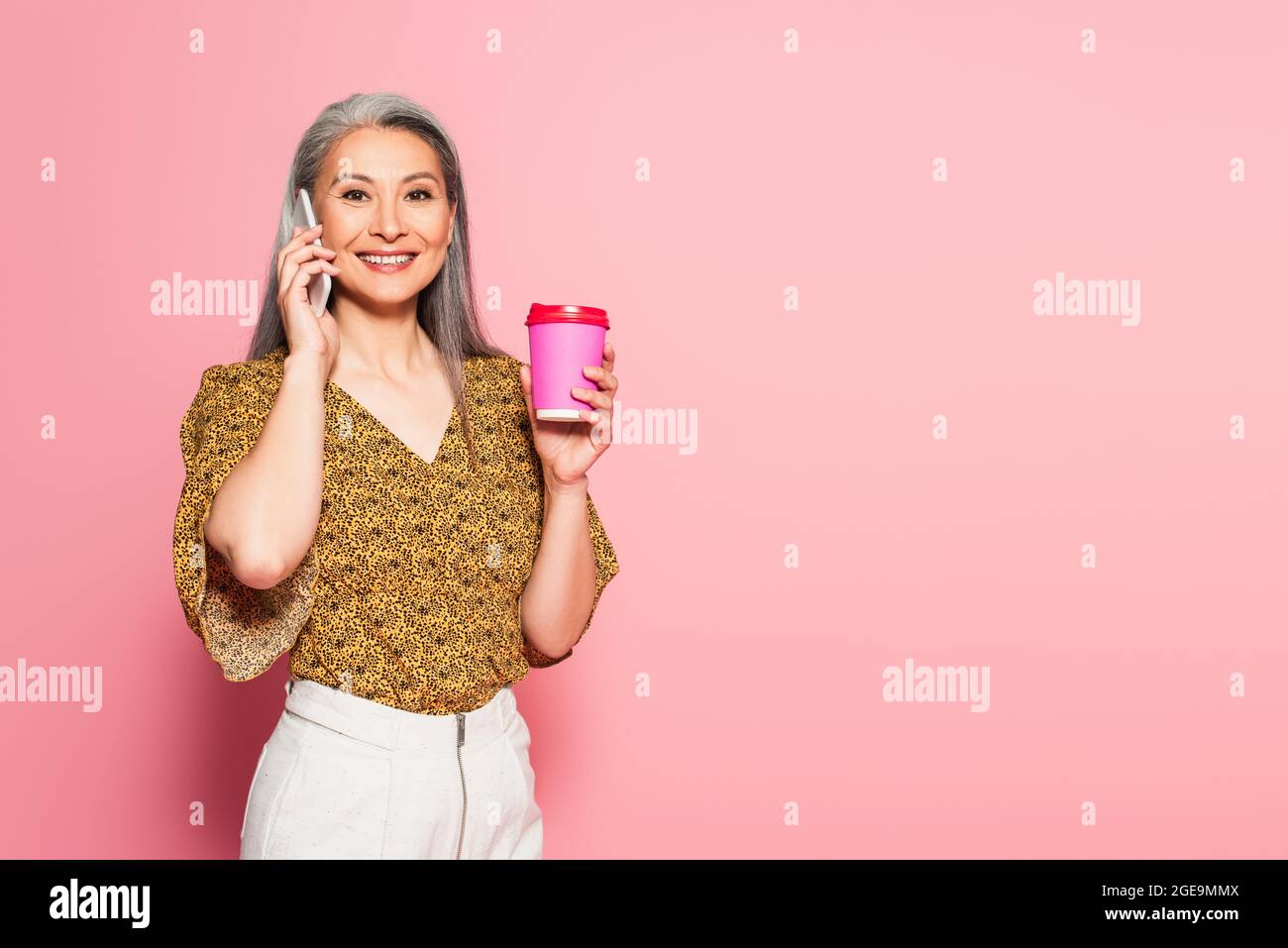 Happy mature woman calling hi-res stock photography and images - Alamy