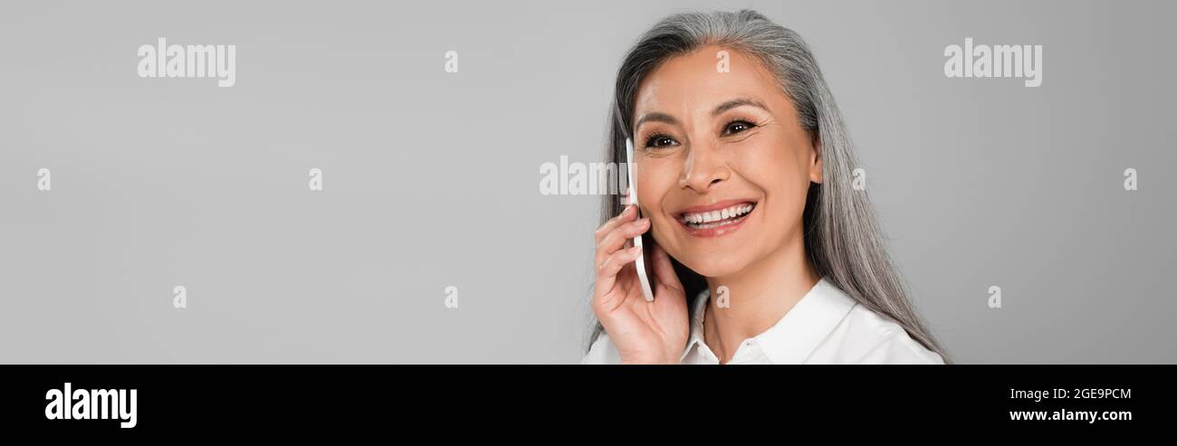 Happy mature woman calling hi-res stock photography and images - Alamy