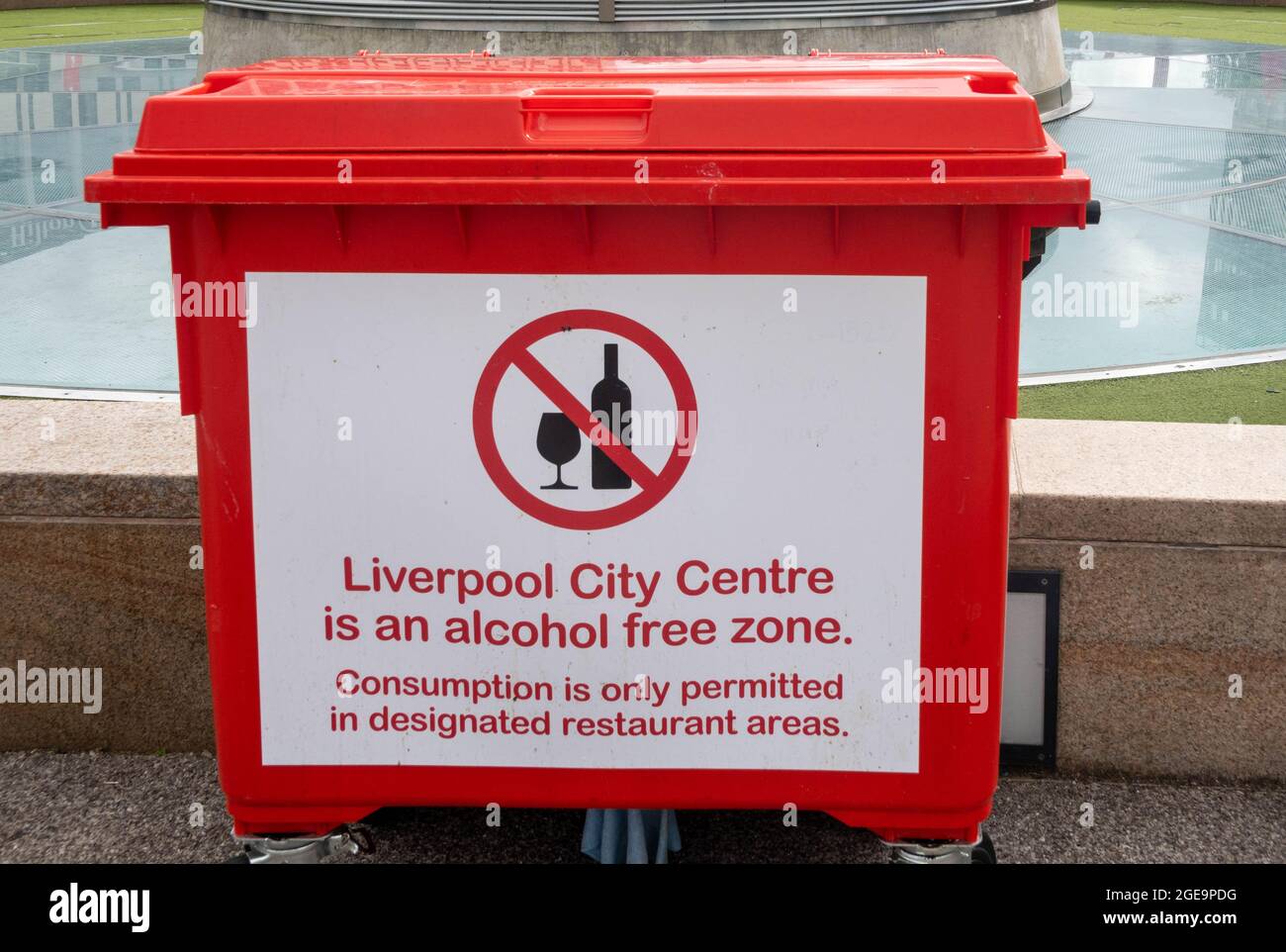 Warning sign on the side of a trash bin in Liverpool Stock Photo Alamy