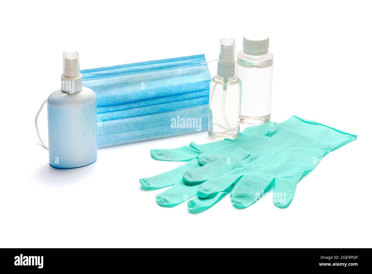 Disposable blue medical face mask, rubber latex gloves and alcohol hand