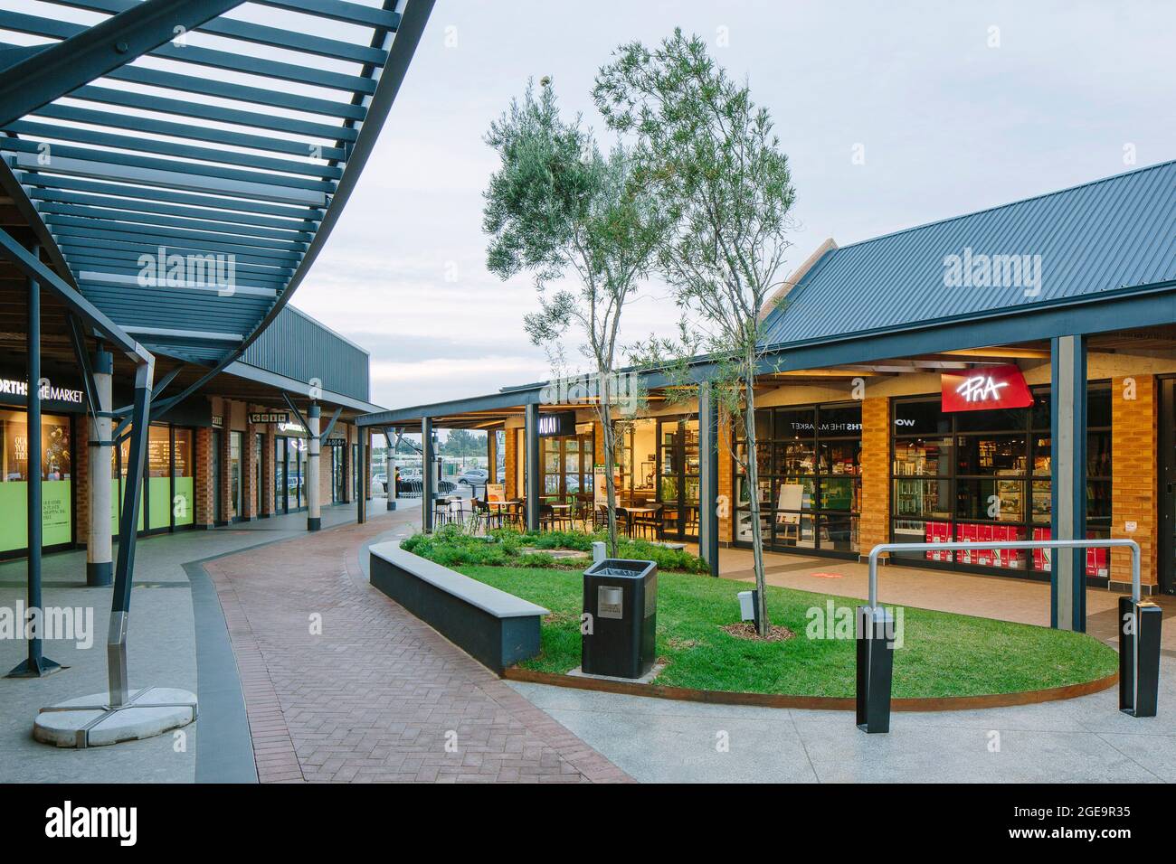 Portico covered walkways and landscaping. Castle Gate Lifestyle