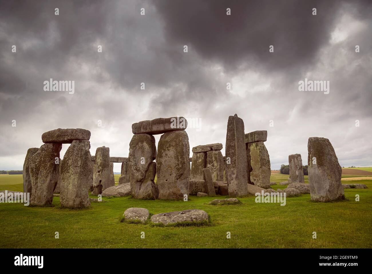 Stonehenge under stormy grey clouds. Stock Photo