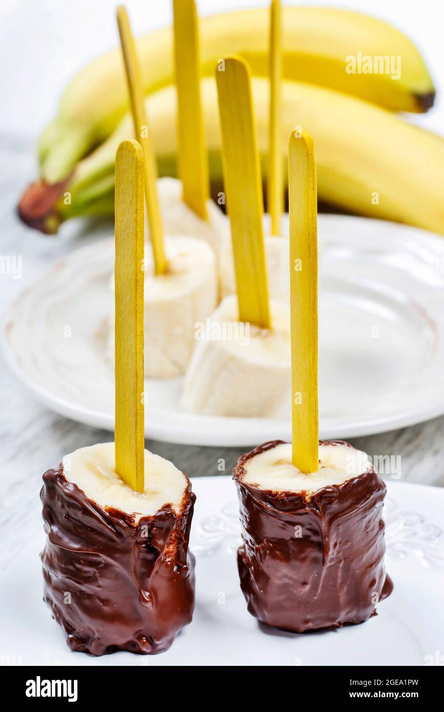 Chocolate dipped bananas. PArty dessert Stock Photo Alamy