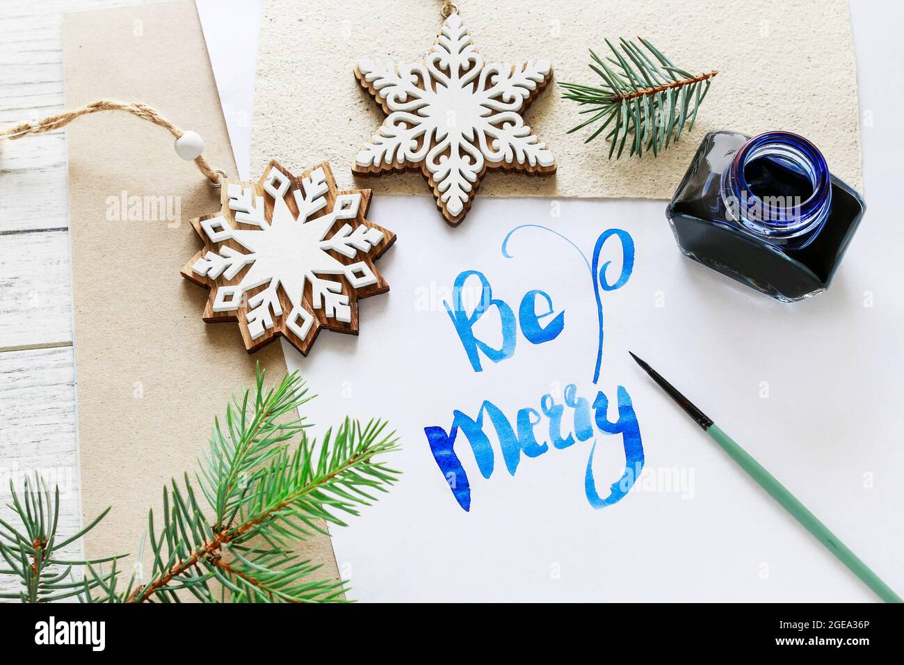 Be Merry - calligraphy, handwritten letters on white paper. Retro style ...