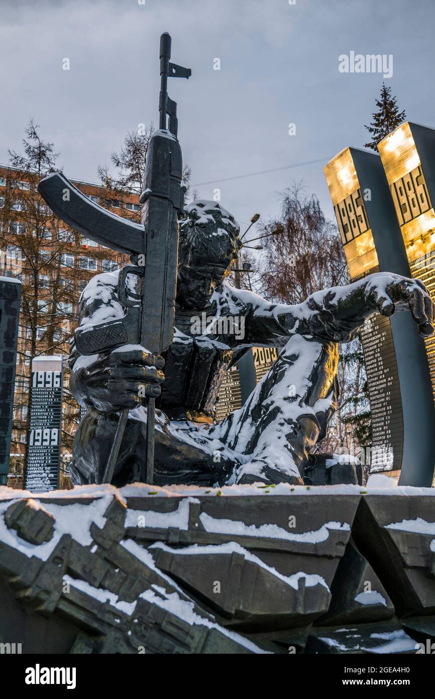 The strain of war is permanently etched upon this statue of a weary soldier in Ekateringburg in Russia. Stock Photo