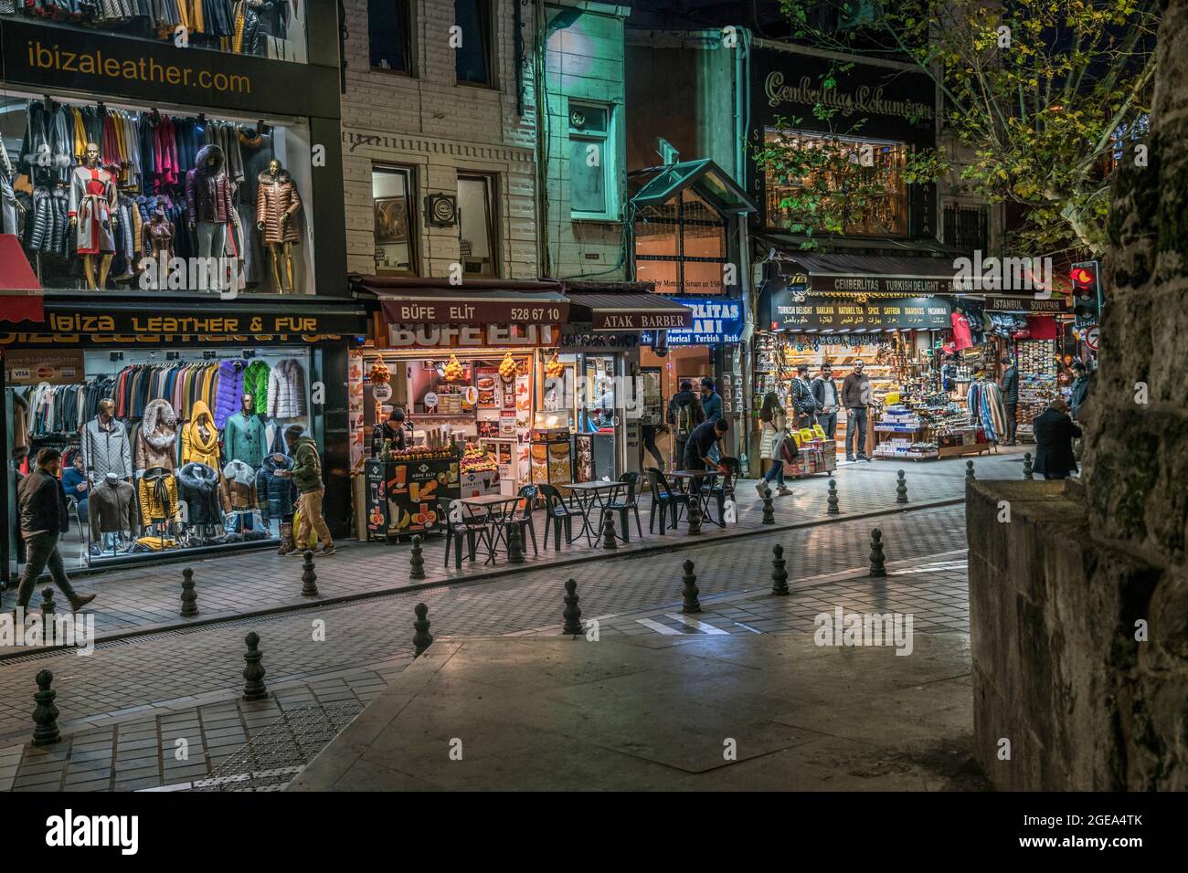 Shopping on the streets of Istanbul next to the base of the fourth century Column of Constantine. Stock Photo