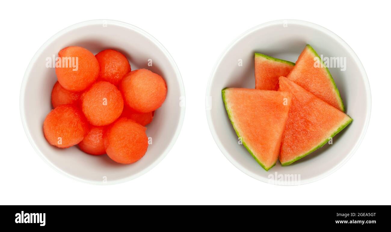 Watermelon slices and balls, in white bowls. Freshly cut out spheres, and triangular shaped pieces of ripe and seedless Citrullus lanatus. Stock Photo