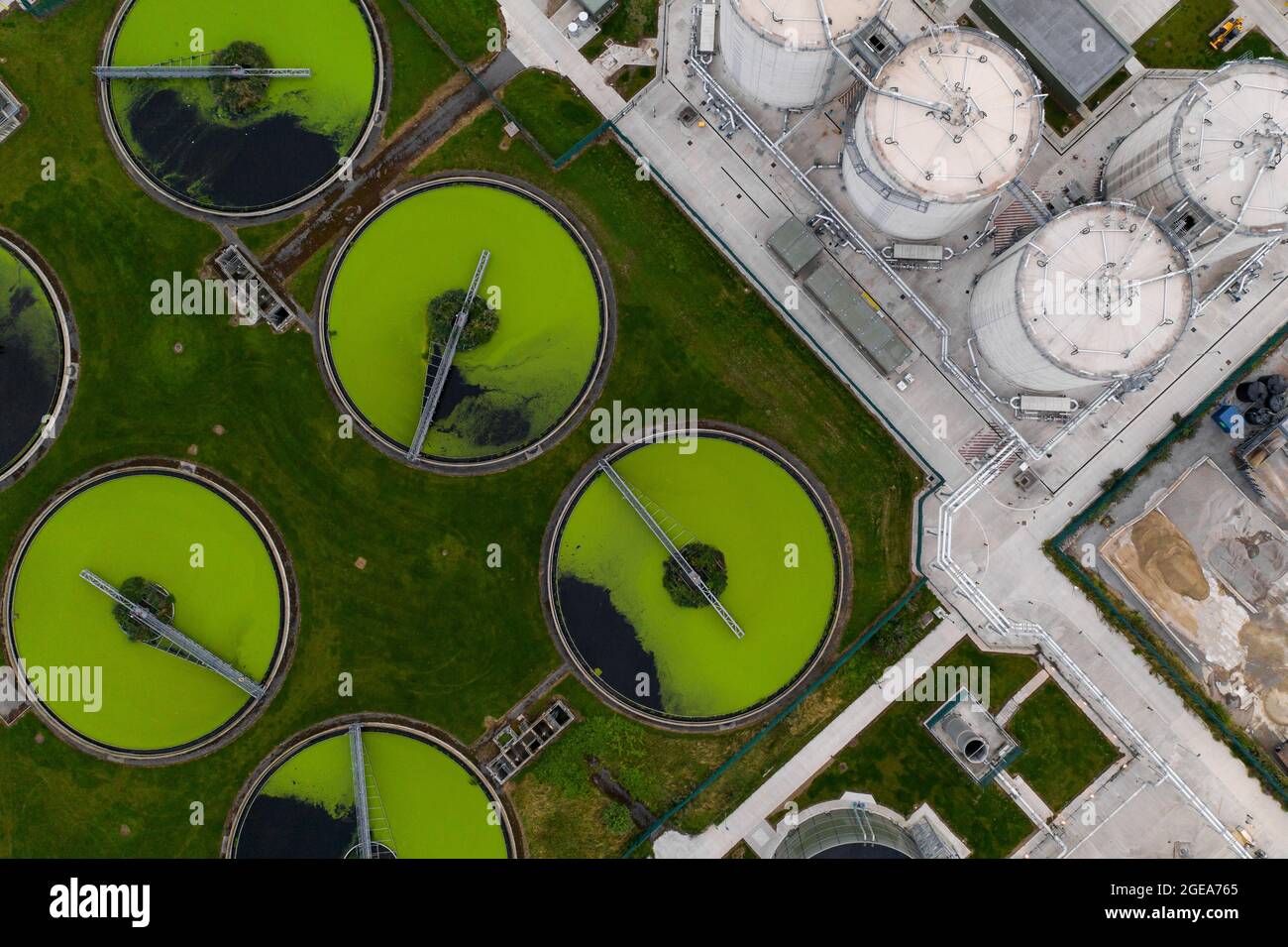 Aerial view of the tanks of a UK sewage and water treatment plant ...