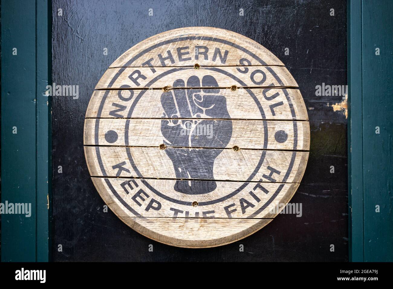 Northern Soul, Keep the Faith wooden sign on door in Sheffield, Yorkshire, UK on 18 May 2018 Stock Photo