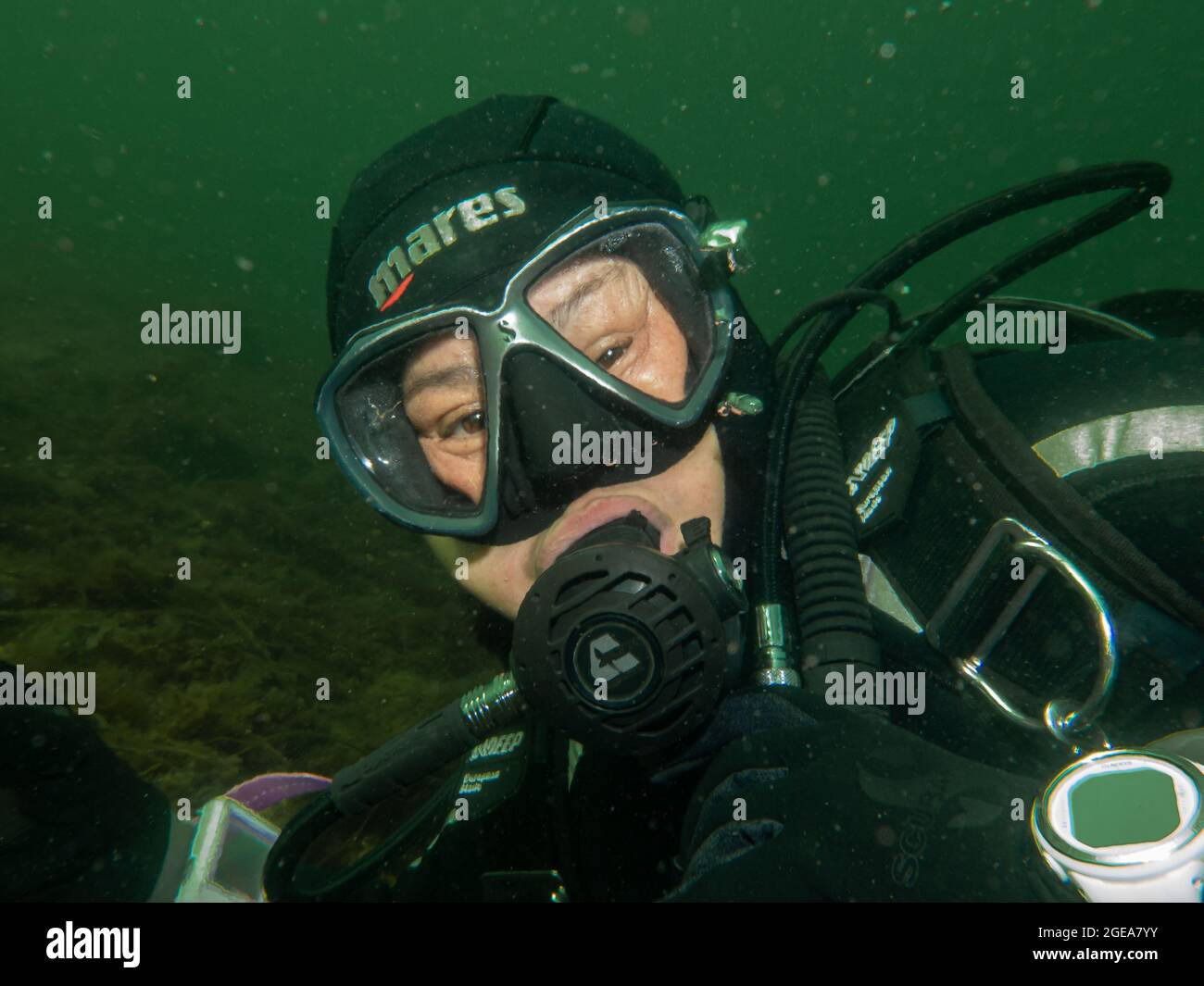 August 4, 2021 - Malmo, Sweden: A close-up picture of a female scuba diver. Many have been introduced to cold water diving after travel restrictions have taken place Stock Photo