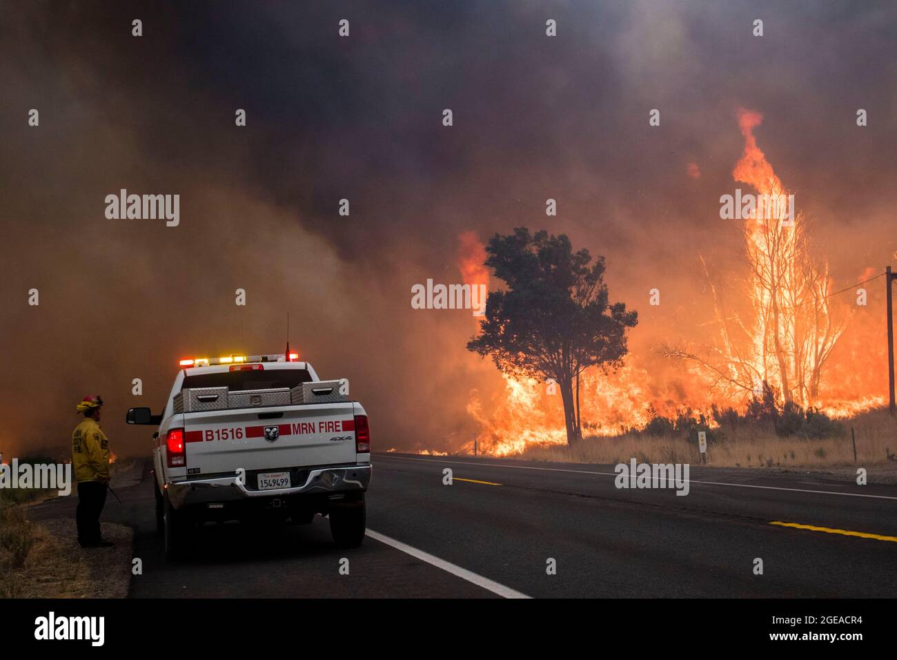 United States. 17th Aug, 2021. Fire crews watch as the Dixie fire burns