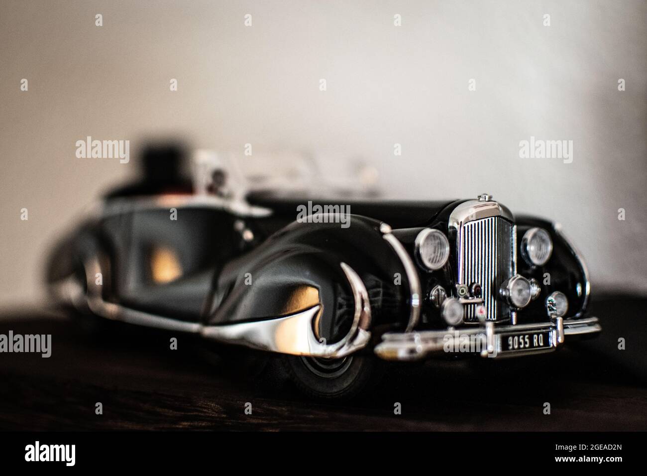 A decorative model of a classic car, a black 1947 Bentley. Stock Photo