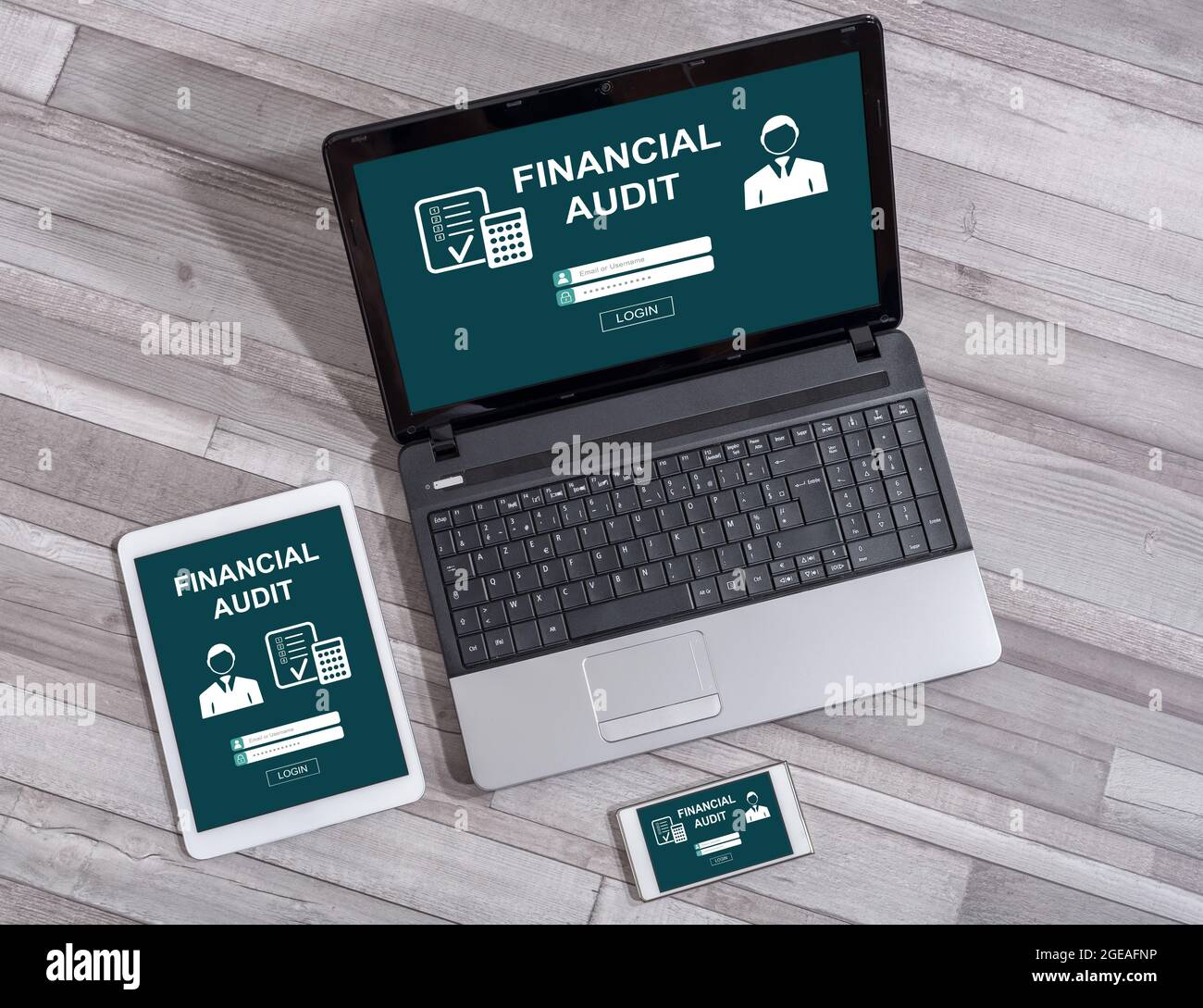 Financial audit concept shown on different information technology devices Stock Photo