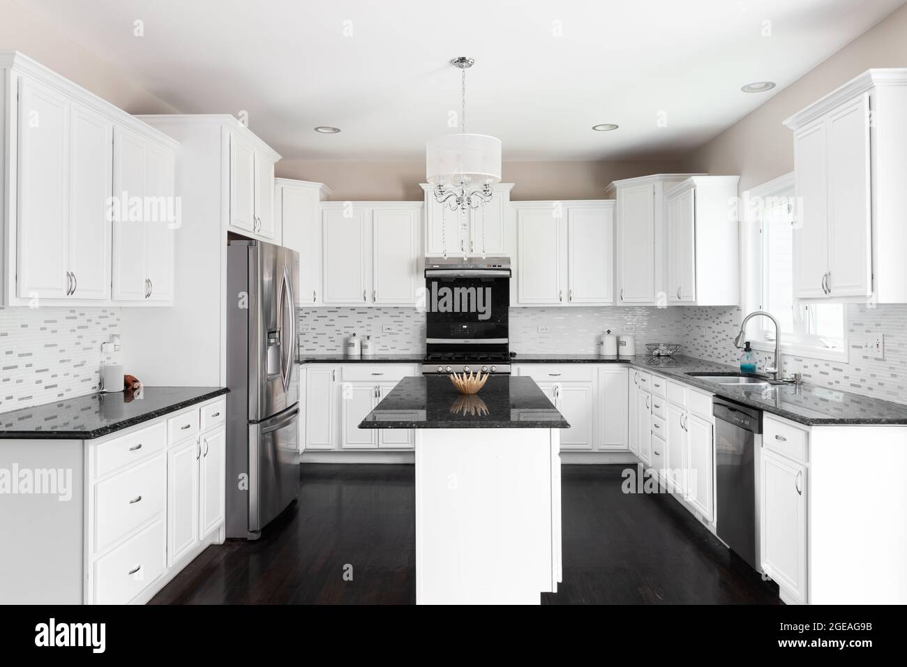 White kitchen 2024 with black granite