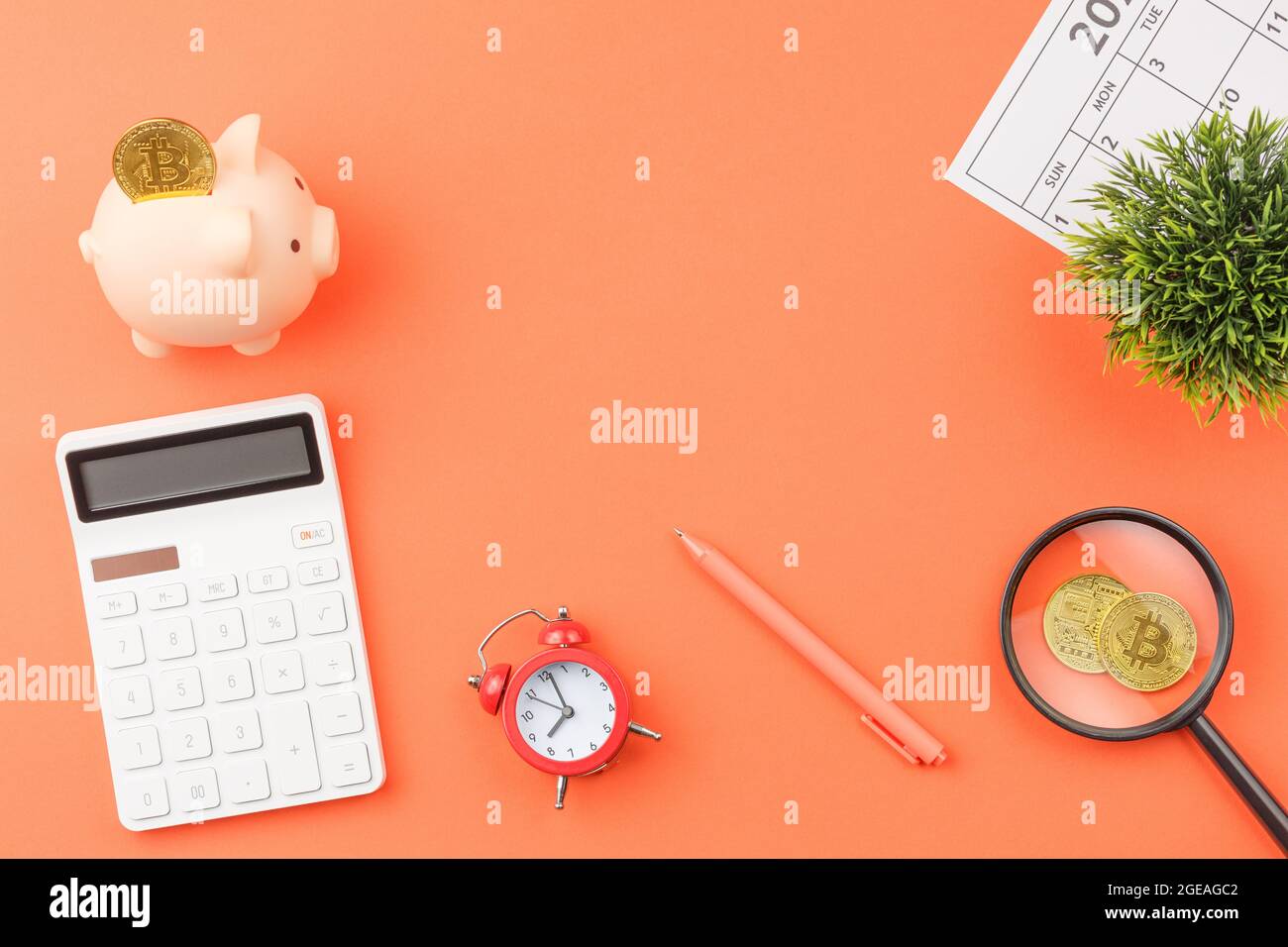 Piggy bank with calculators office desk top view Stock Photo Alamy