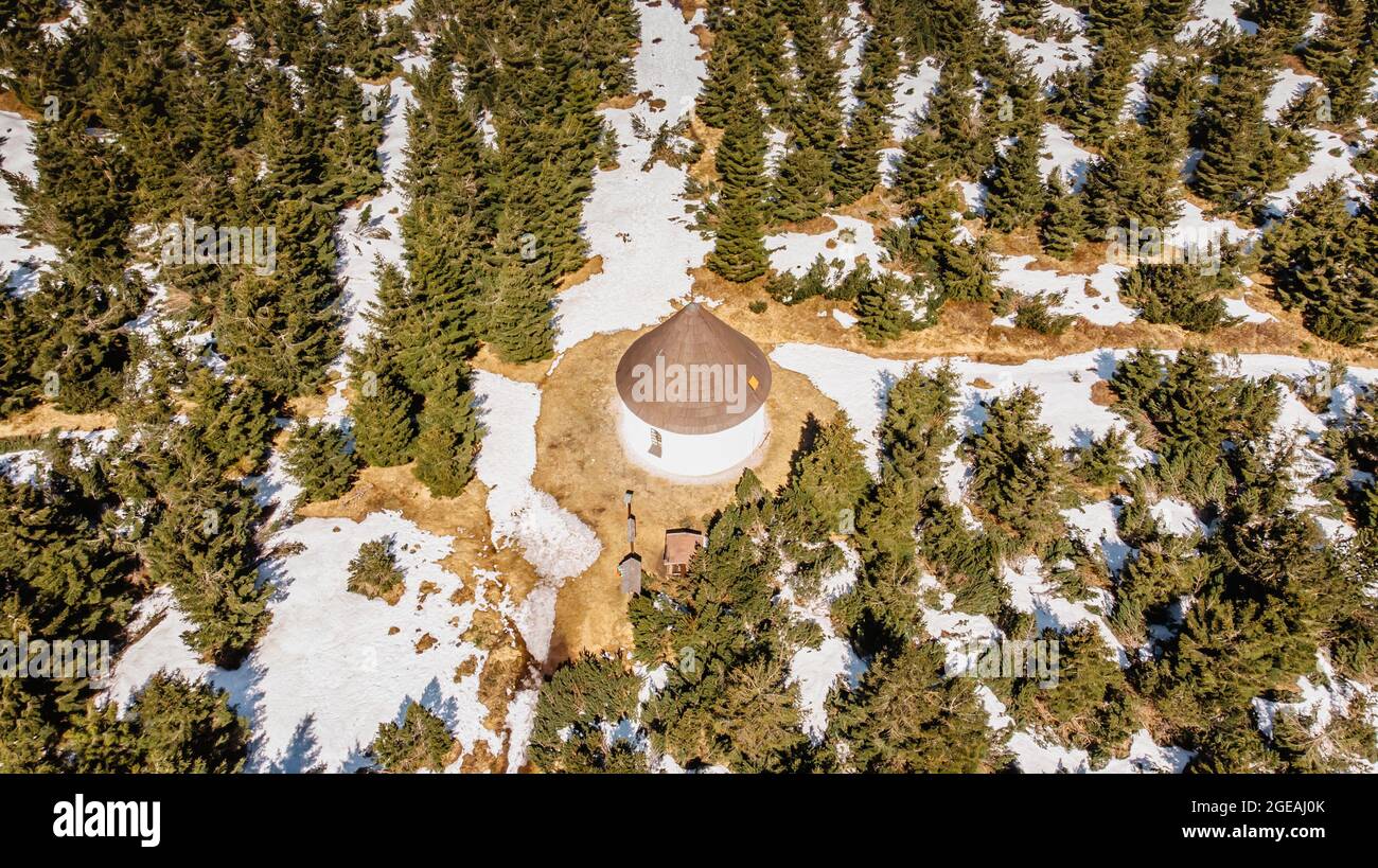Aerial view of baroque Chapel of the Visitation of Virgin Mary,Kunstat Chapel located in forest of Eagle Mountains,Czech Republic.Circular floor Stock Photo