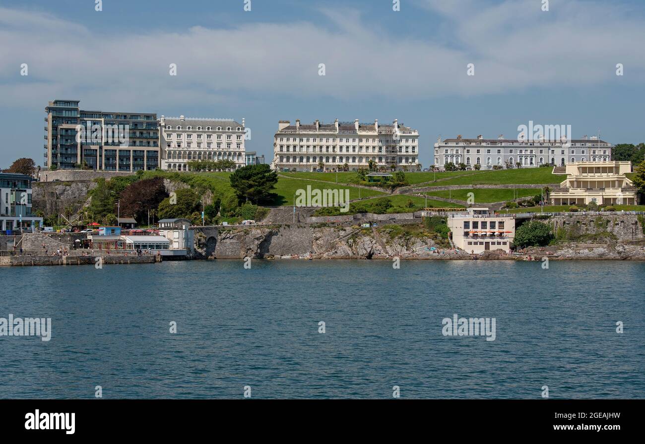 Plymouth, Devon, England, UK. 2021. View of the Plymouth waterfront properties seen from Plymouth Sound viewing Plymouth Hoe, and overlooking building Stock Photo