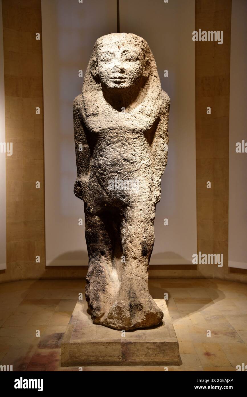 Limestone Colossus of unknown date from Byblos (Jbail), on the ground floor of the National Museum, Beirut, Lebanon. Stock Photo