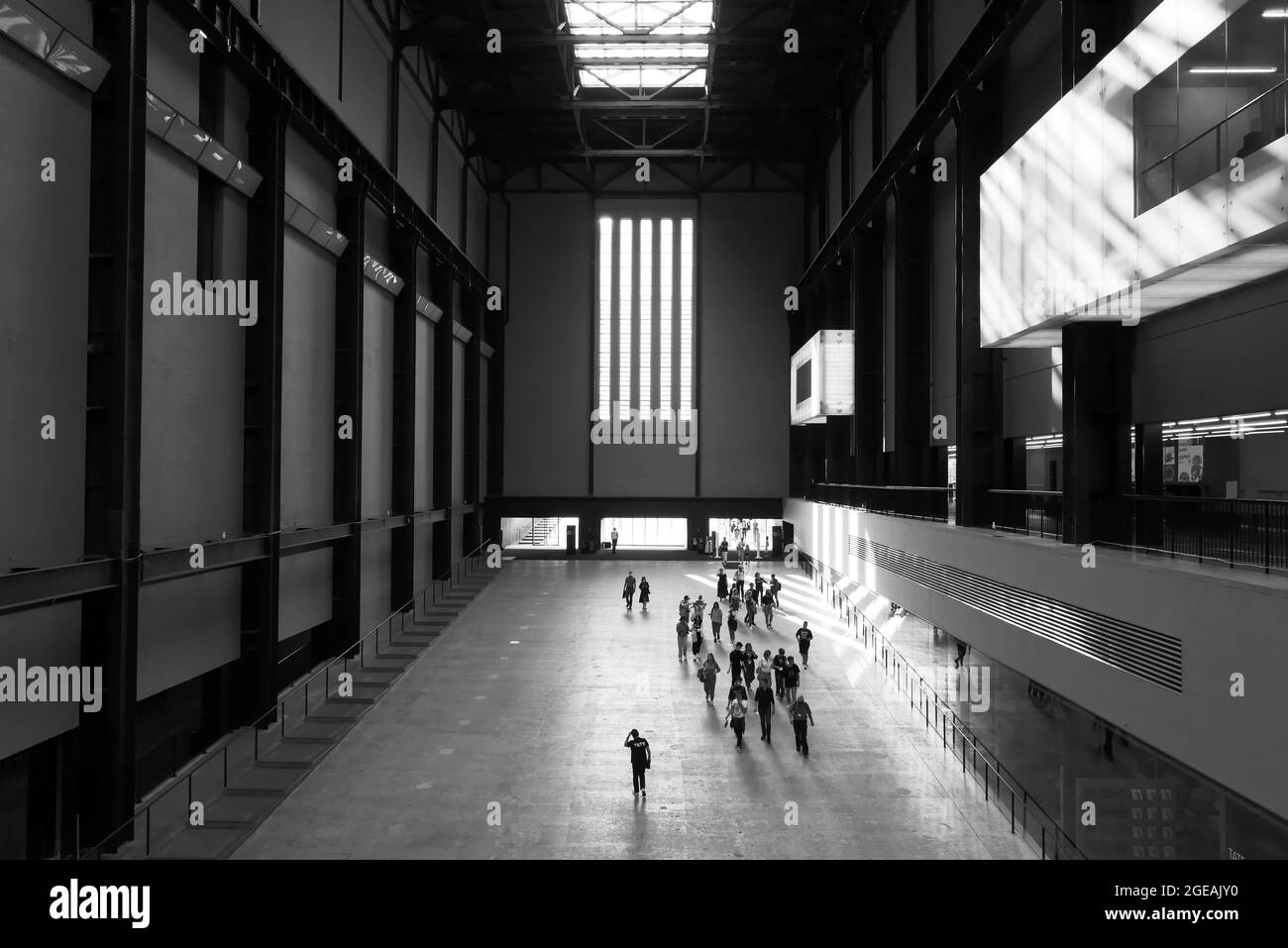 London, Greater London, England, August 10 2021: Visitors arriving at the entrance to the Tate Modern art gallery. Monochrome. Stock Photo