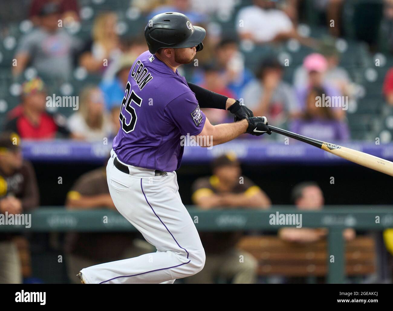 DENVER, CO - SEPTEMBER 08: Colorado Rockies first baseman C.J. Cron (25)  fields his position during an MLB game against the San Francisco Giants on  Sept. 8, 2021 at Coors Field in