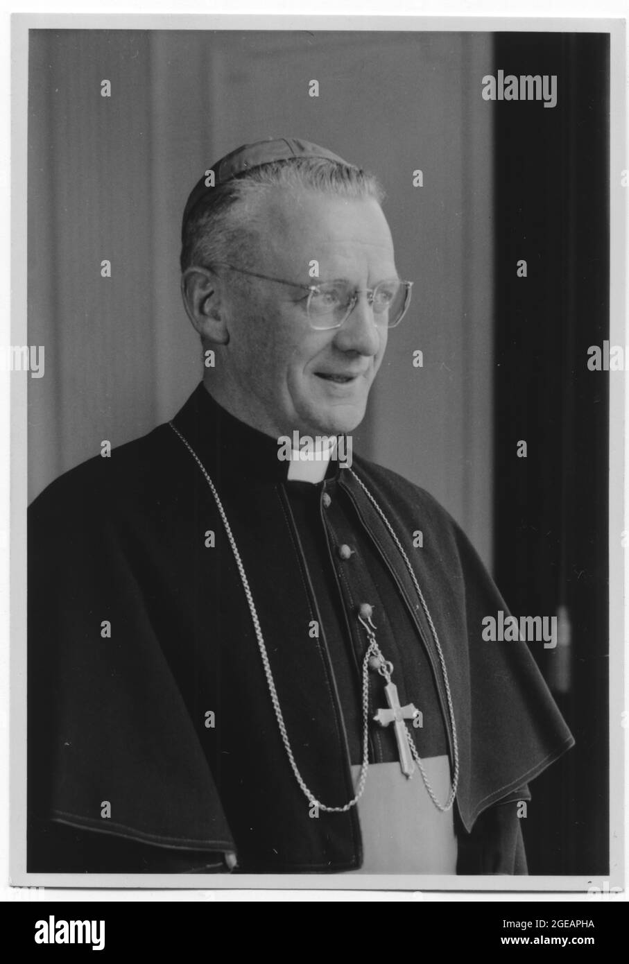 Priest of English roman catholic church wearing skullcap and pectoral cross. Black and white photography Stock Photo
