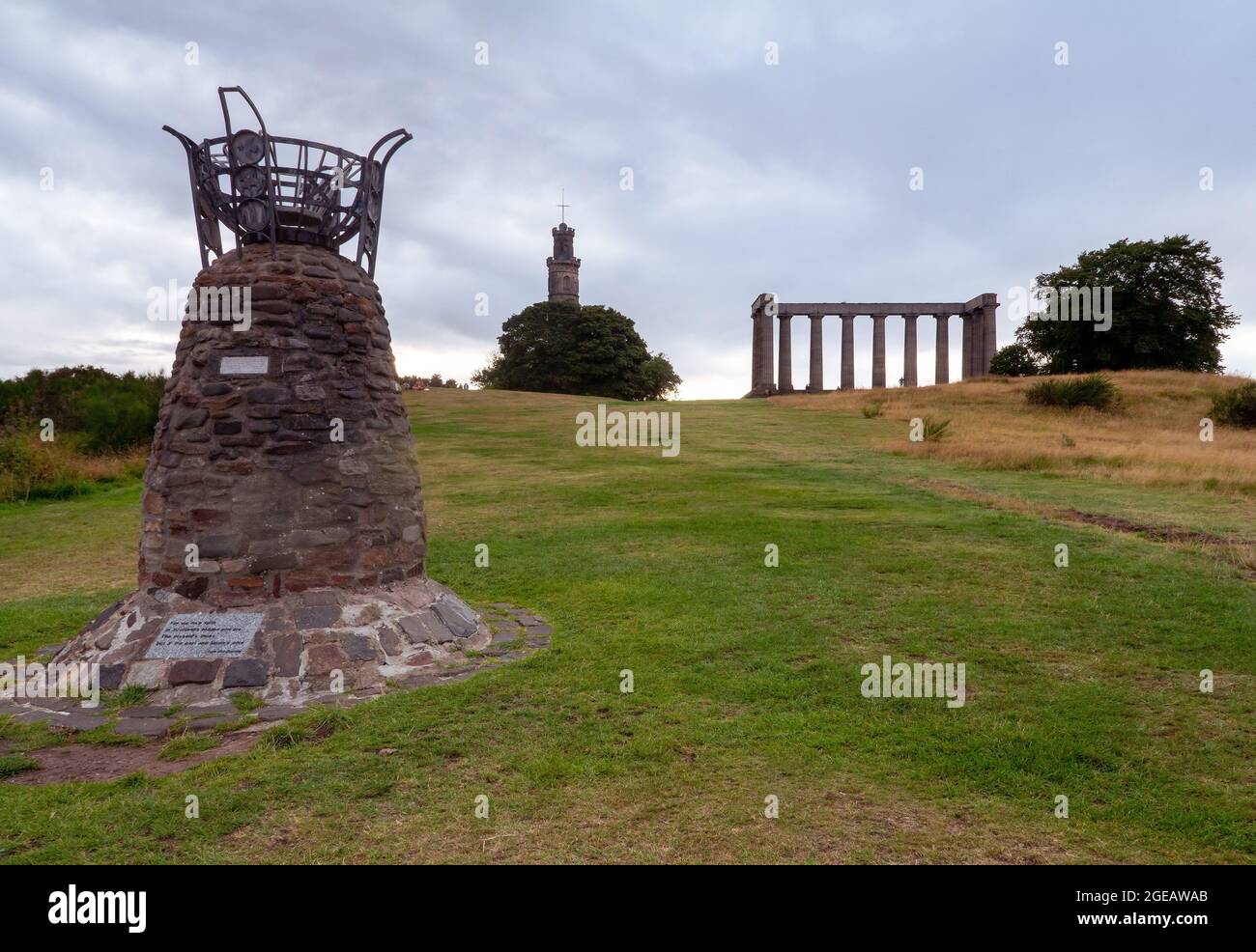 Nelson Monument, National Monument of Scotland and a Cairn on Calton Hill in Edinburgh, Scotland, UK Stock Photo