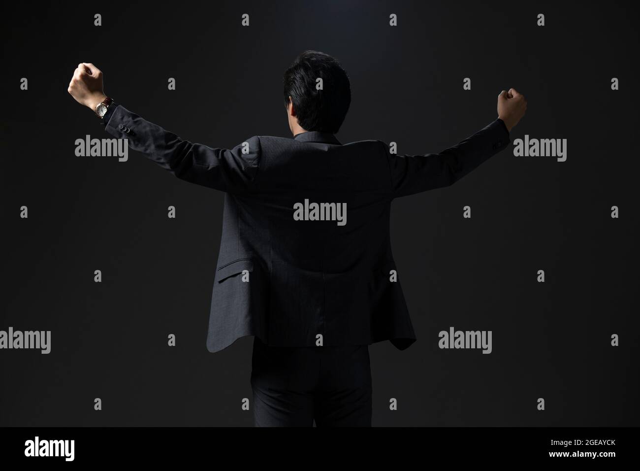 Successful Chinese businessman punching the air Stock Photo Alamy