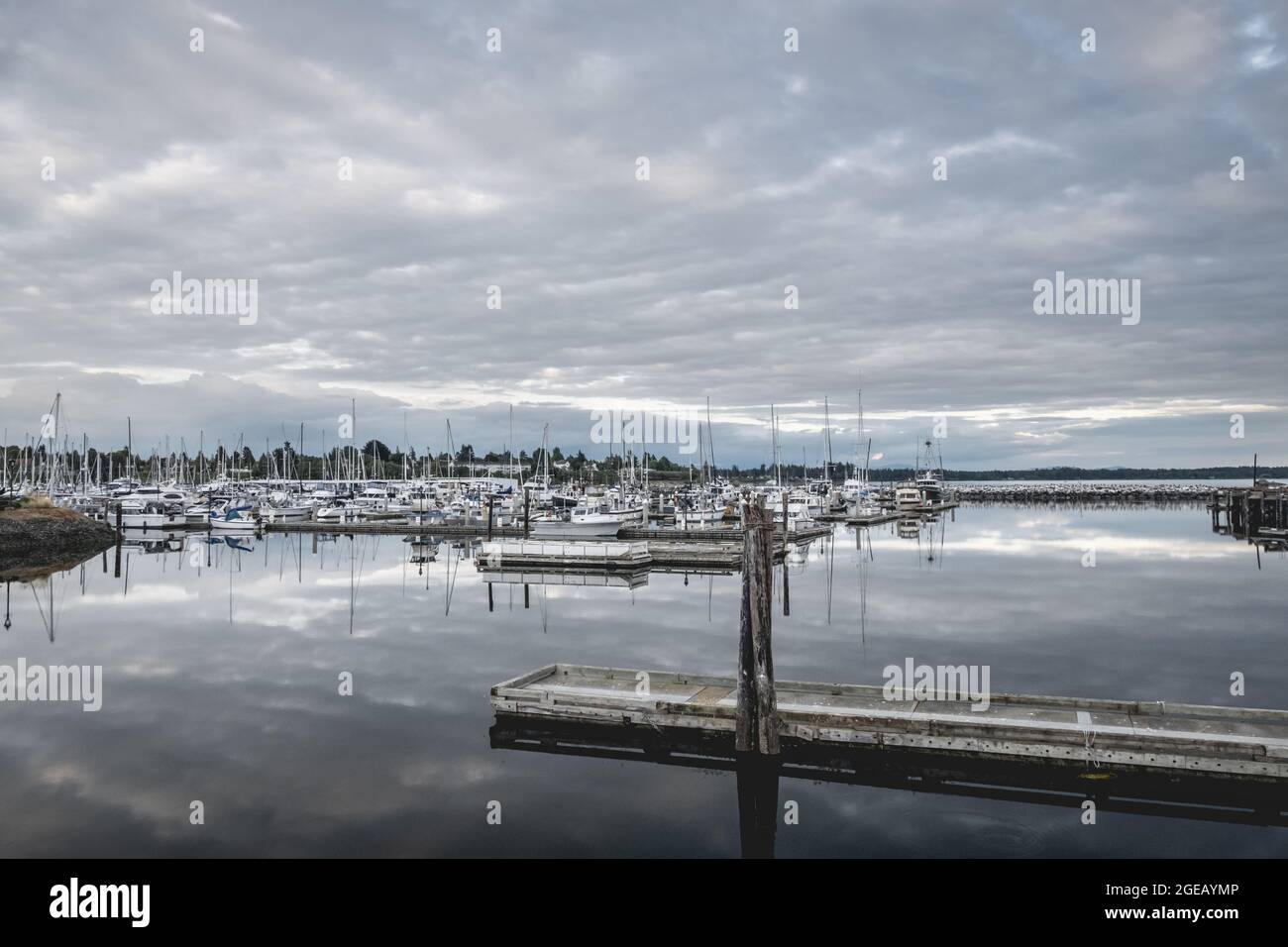 Clouds reflecting on the water at Blaine Harbor in Blaine, Washington. Stock Photo