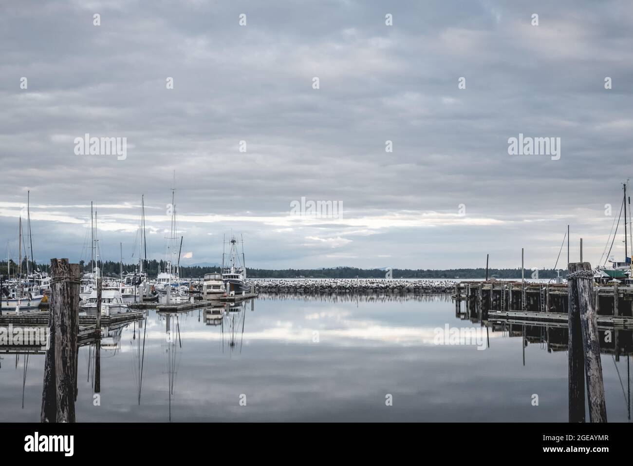 Clouds reflecting on the water at Blaine Harbor in Blaine, Washington. Stock Photo
