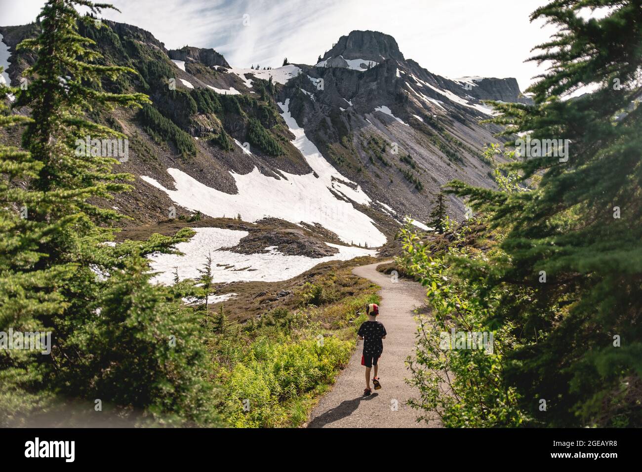 Young boy hiking at Heather Meadows in the Mt. Baker-Snoqualmie National Forest. Stock Photo