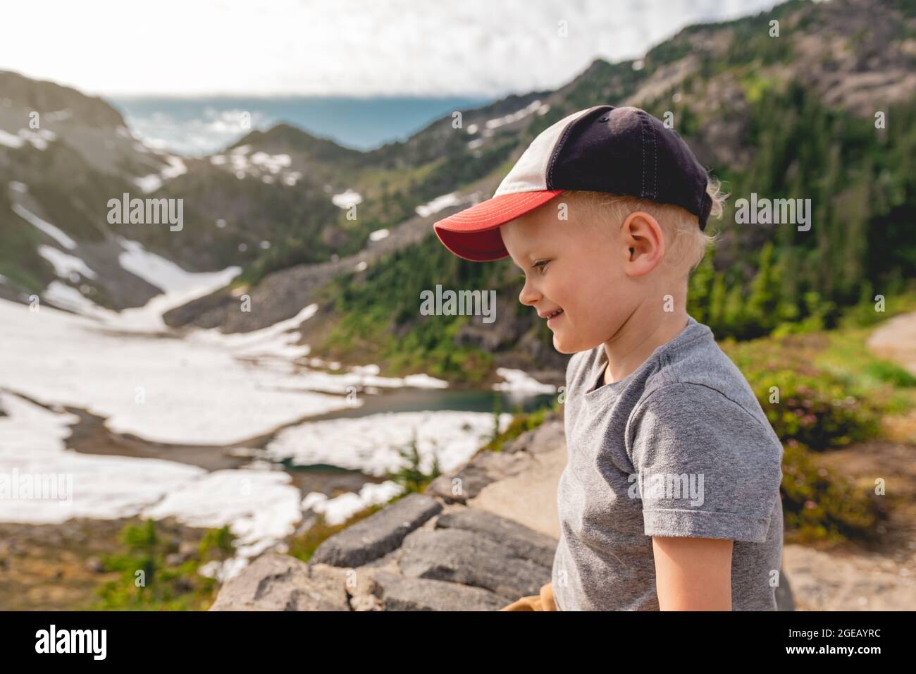 Young boy hiking at Heather Meadows in the Mt. Baker-Snoqualmie National Forest. Stock Photo